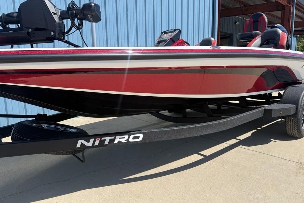 2026 Nitro Z20 XL Pro boat with red and white design on a trailer.