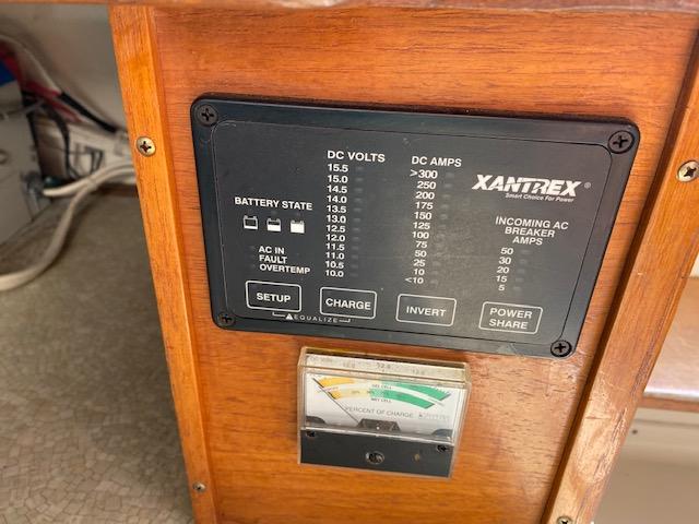 Control panel on a 1972 Bertram Express boat with Xantrex power management system.