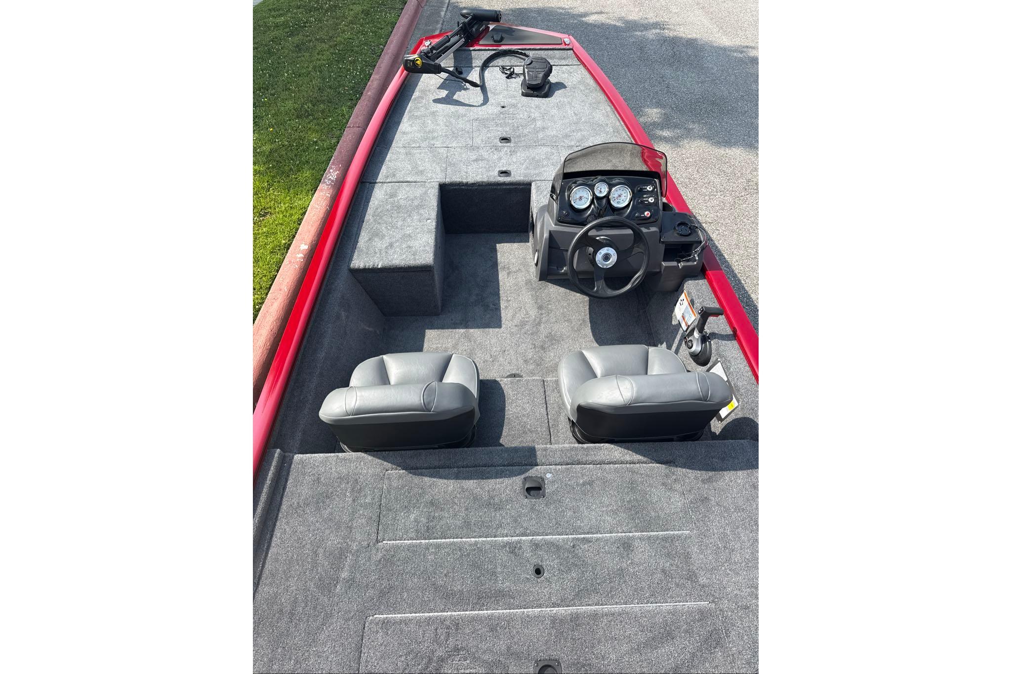 2026 Tracker Pro 170 boat interior with steering console and seating.
