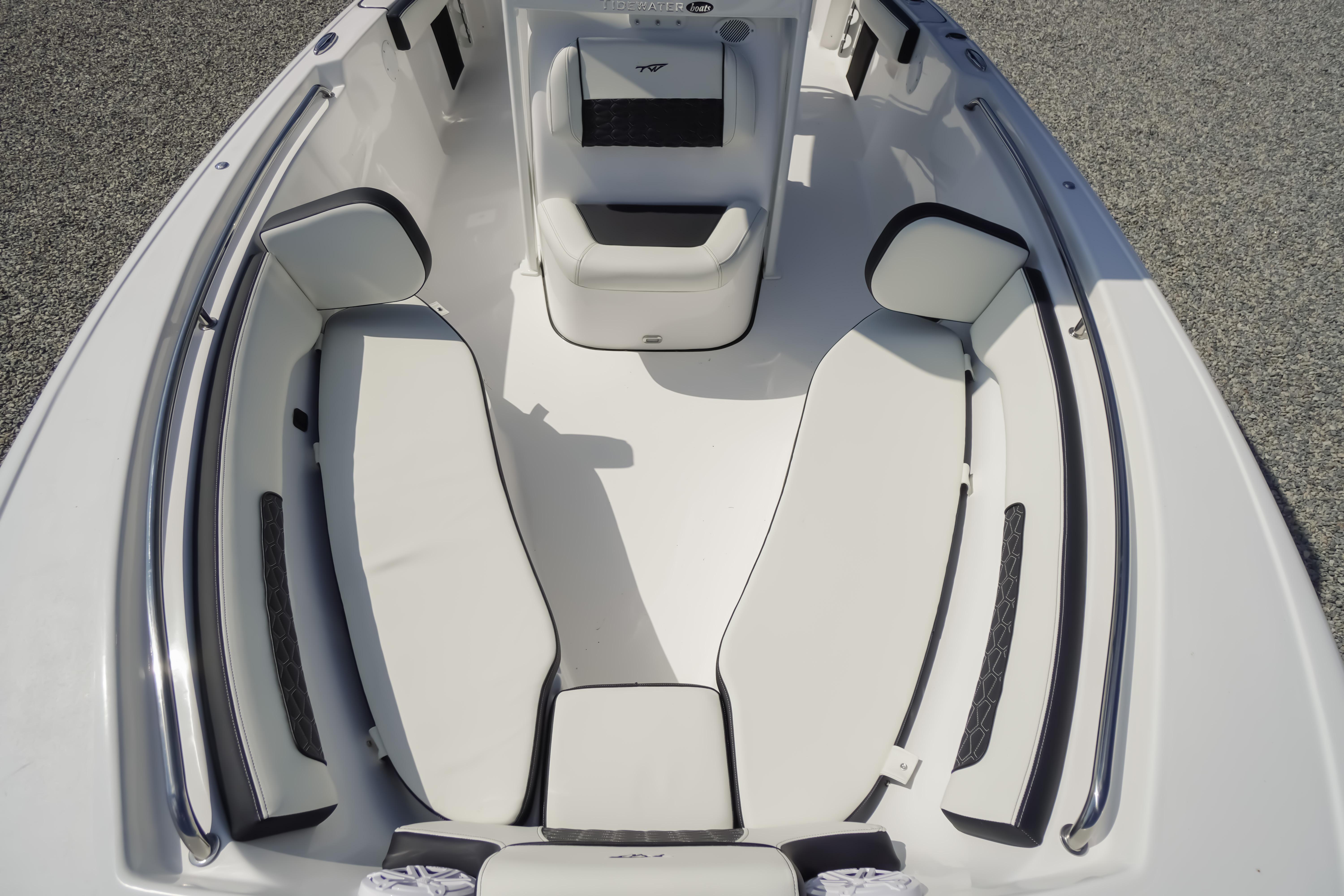 2026 Tidewater 220 CC Adventure boat interior with white seating and sleek design.