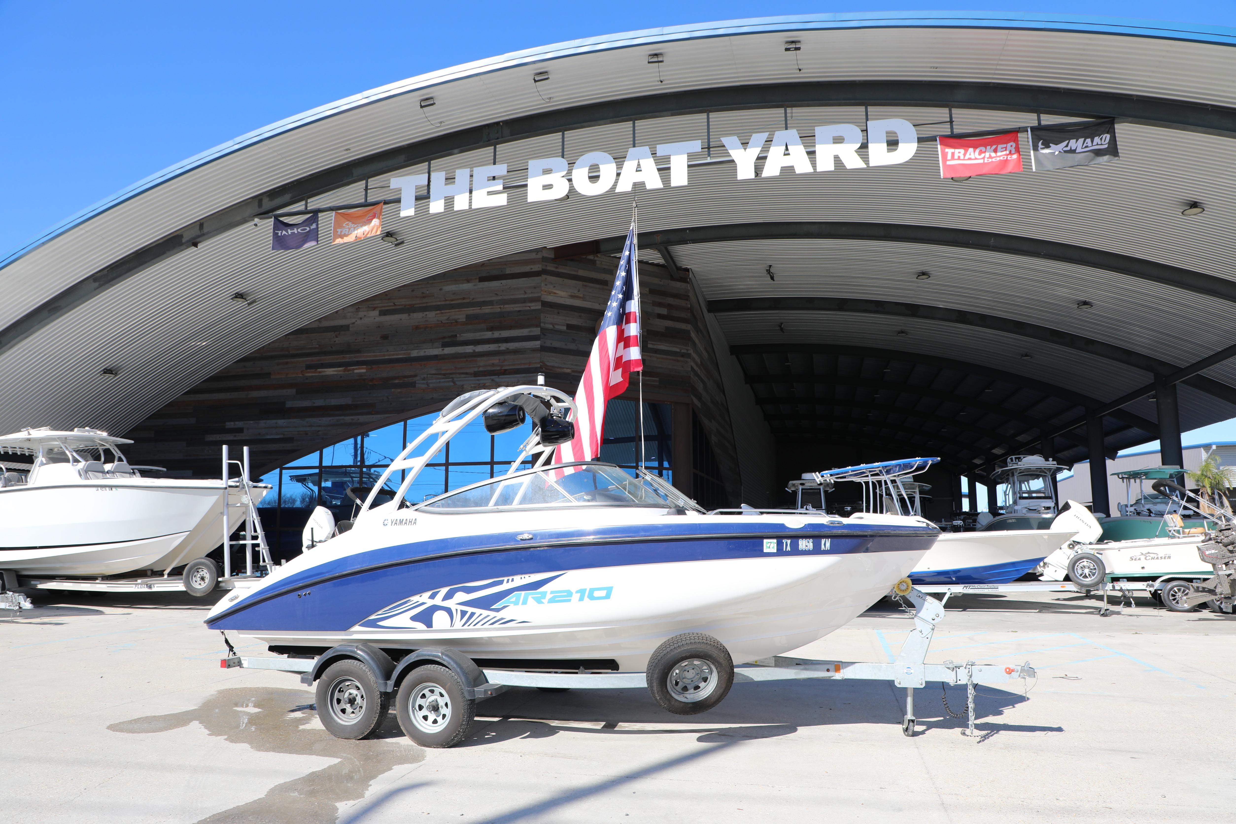 2022 Yamaha AR210 boat on trailer at The Boat Yard dealership.