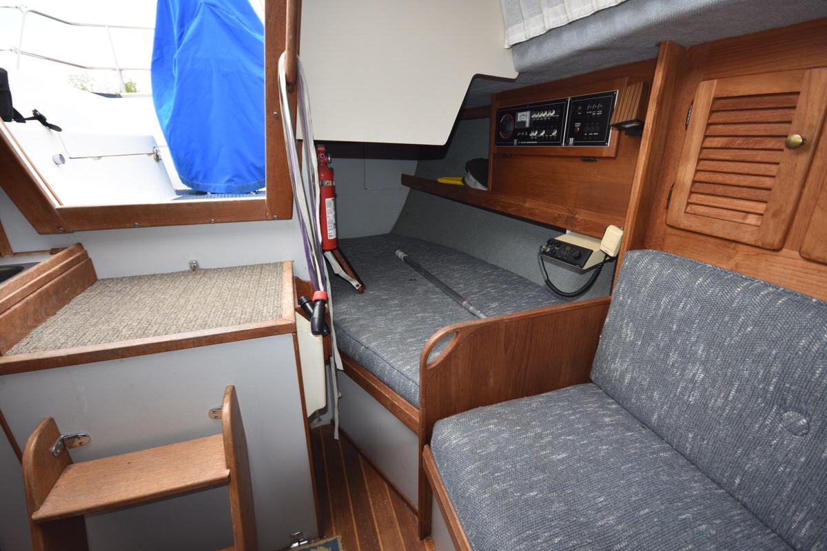 Interior of a 1987 S2 9.2A with gray upholstery and wooden elements.