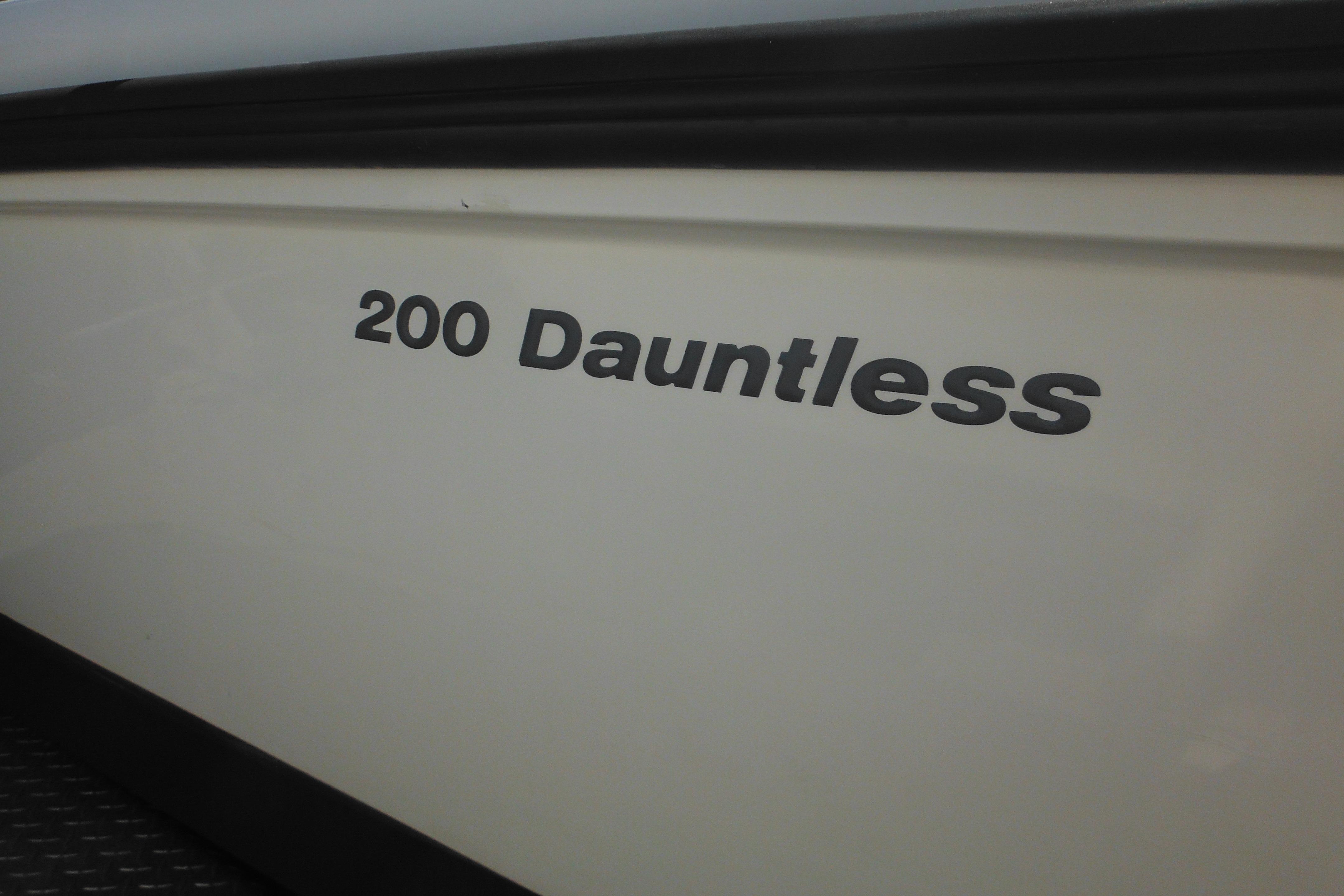 2009 Boston Whaler 200 Dauntless boat side view with model name displayed.