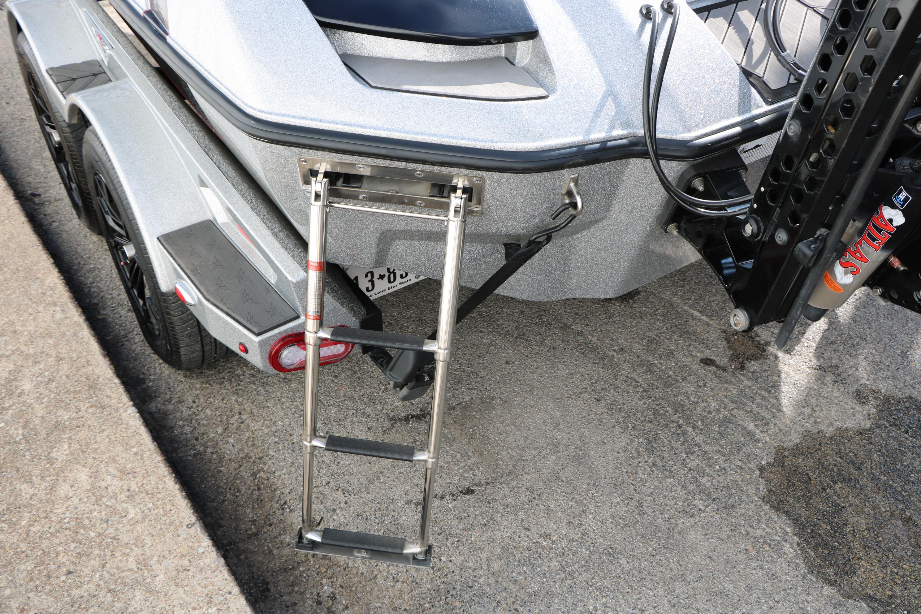 2022 Vexus VX21 boat with rear ladder and trailer detail.