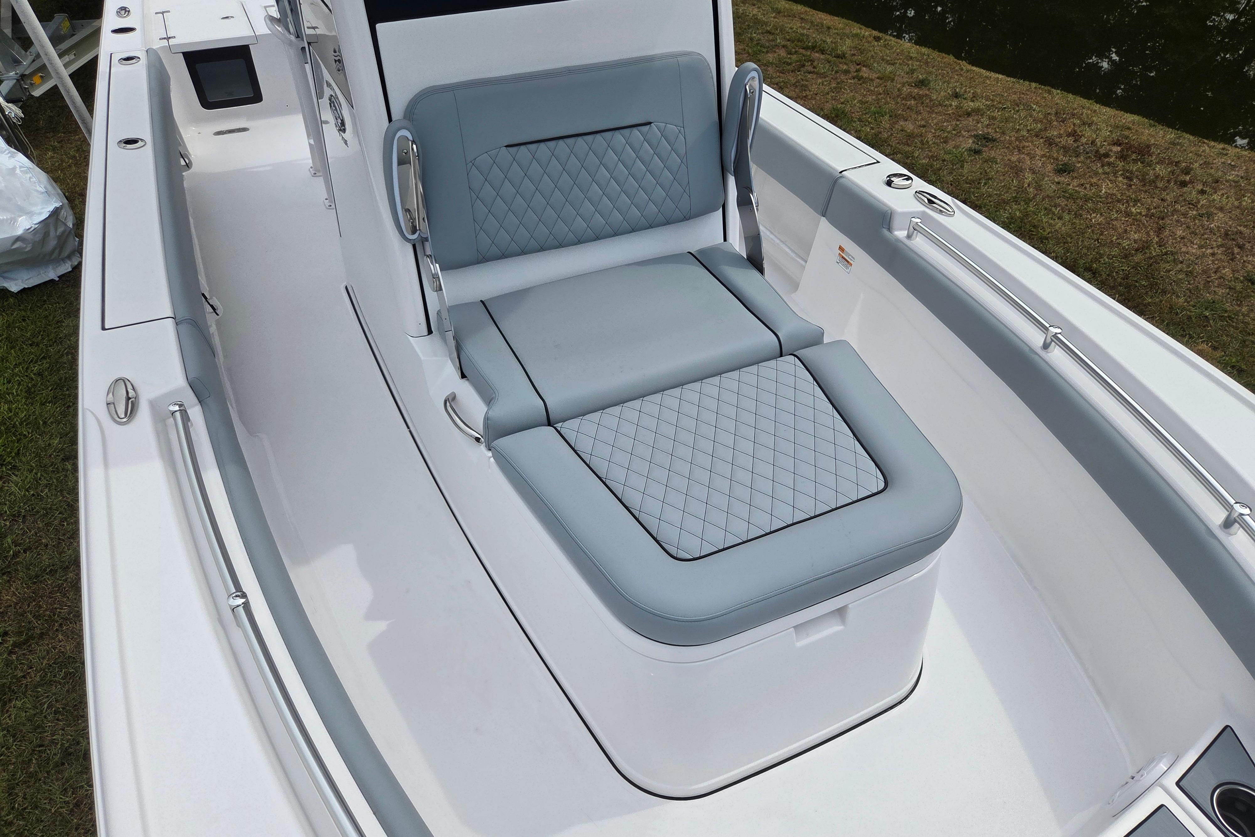 2026 Sportsman Masters 247OE Bay Boat with cushioned seating and sleek design.