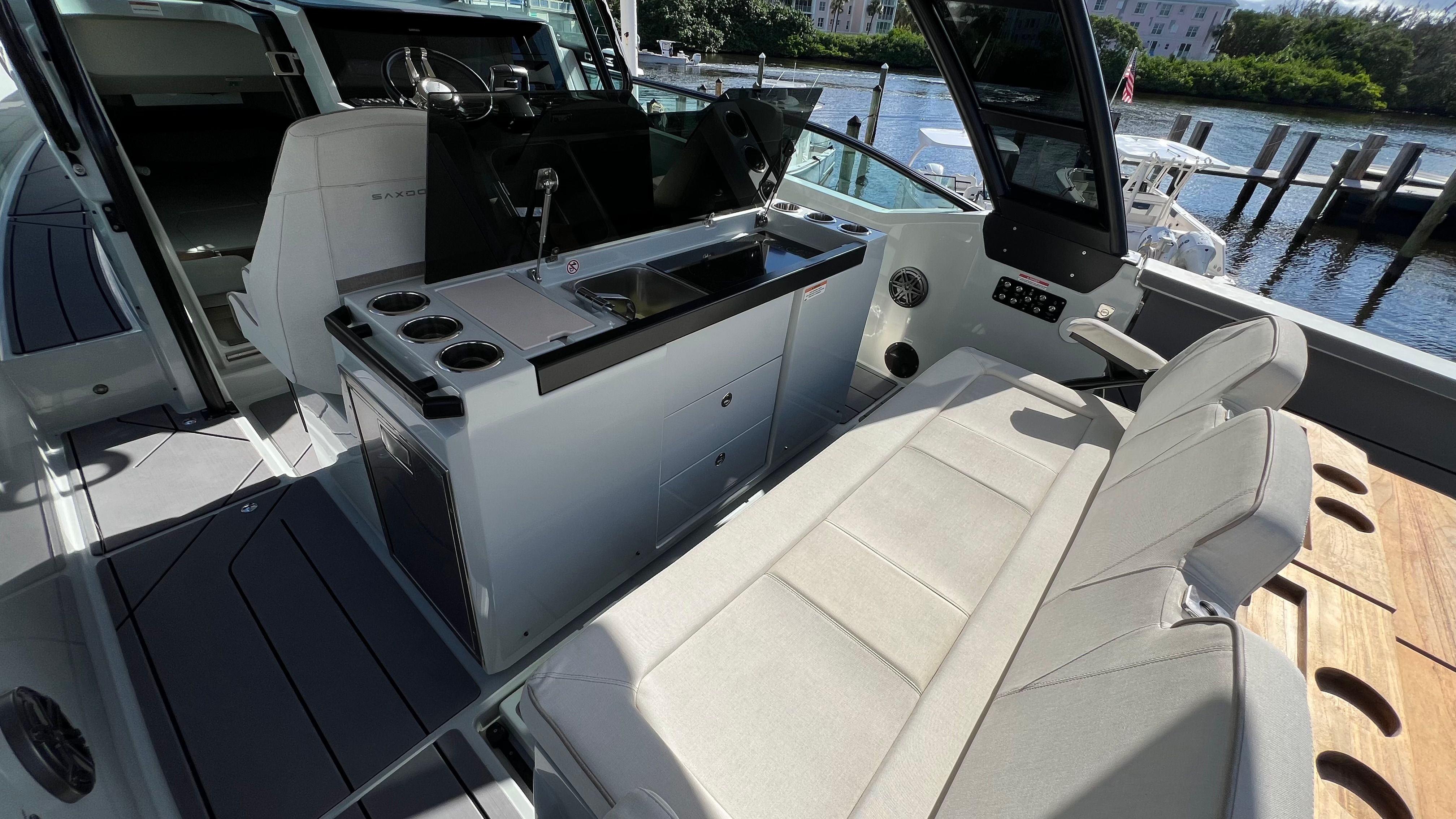 Interior of 2024 Saxdor 320 GTO with seating and helm console.