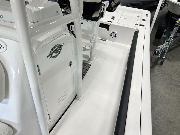 2025 Tidewater 2300 Carolina Bay boat interior with seating and storage compartments.