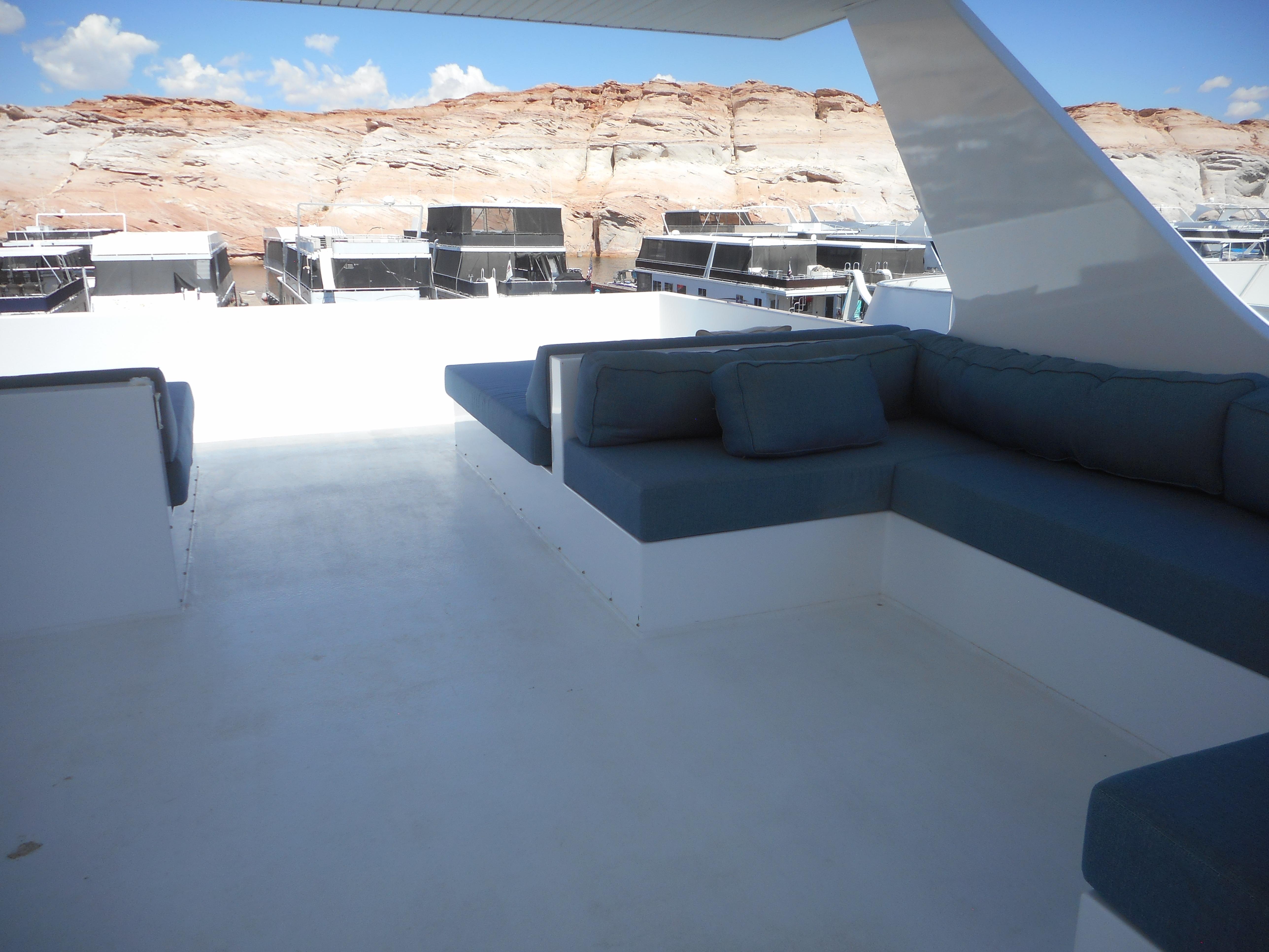 Modern Adonia Pace Trip #7 houseboat with spacious deck and comfortable seating, 2021 model.