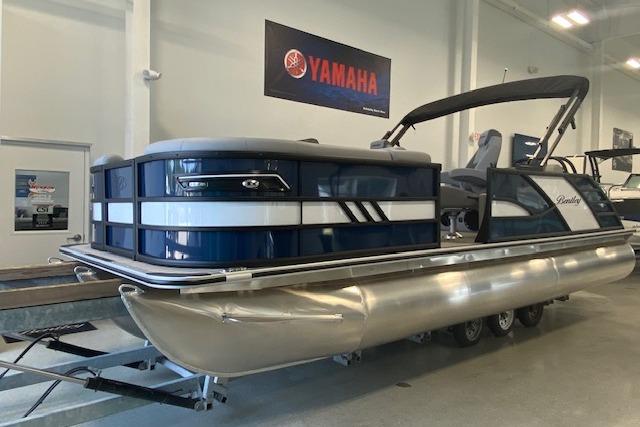 2026 Bentley Pontoons Elite 223 Swingback displayed indoors, featuring sleek design and Yamaha branding.