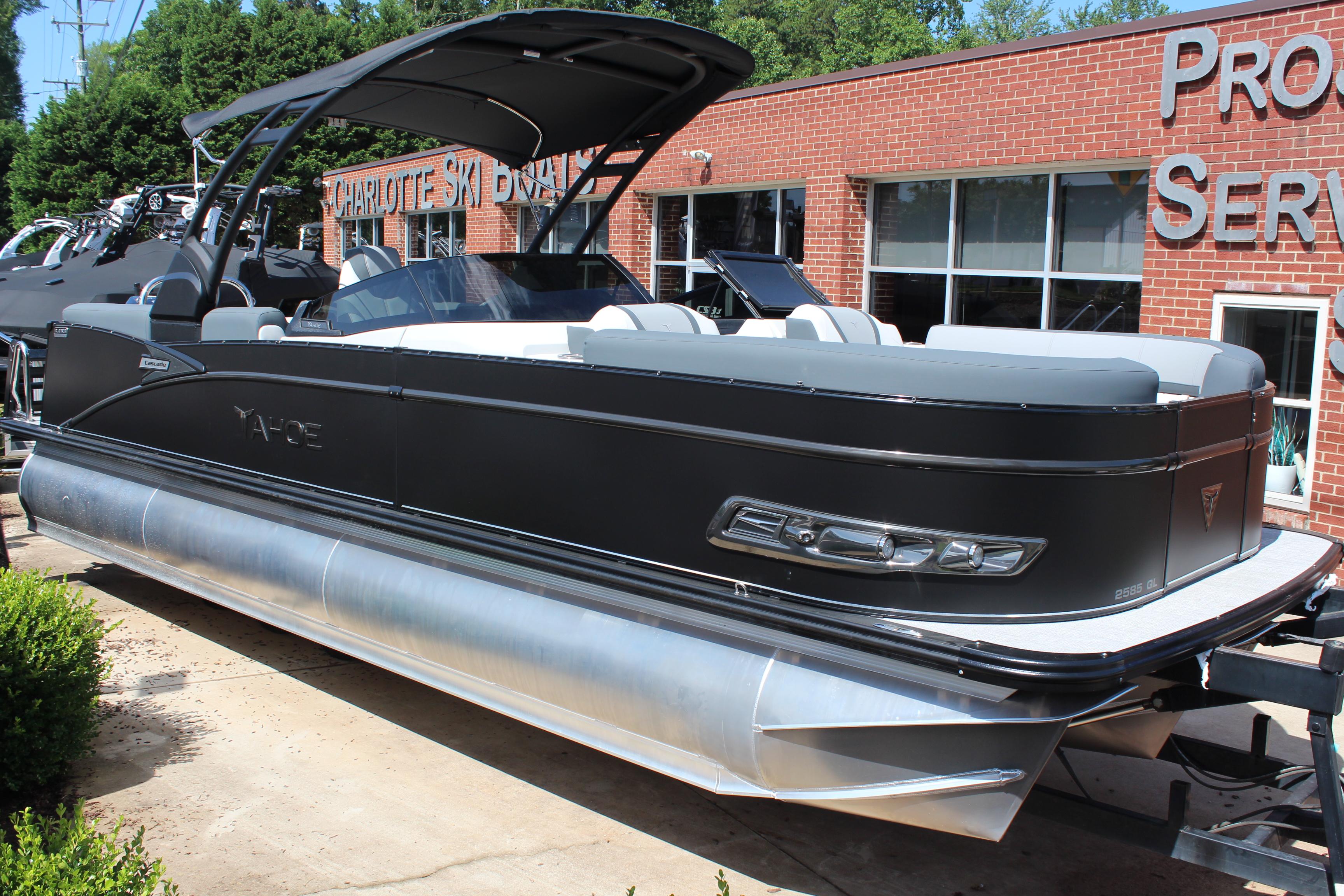 2025 Tahoe Pontoon Cascade Quad Lounge Windshield boat displayed outdoors.