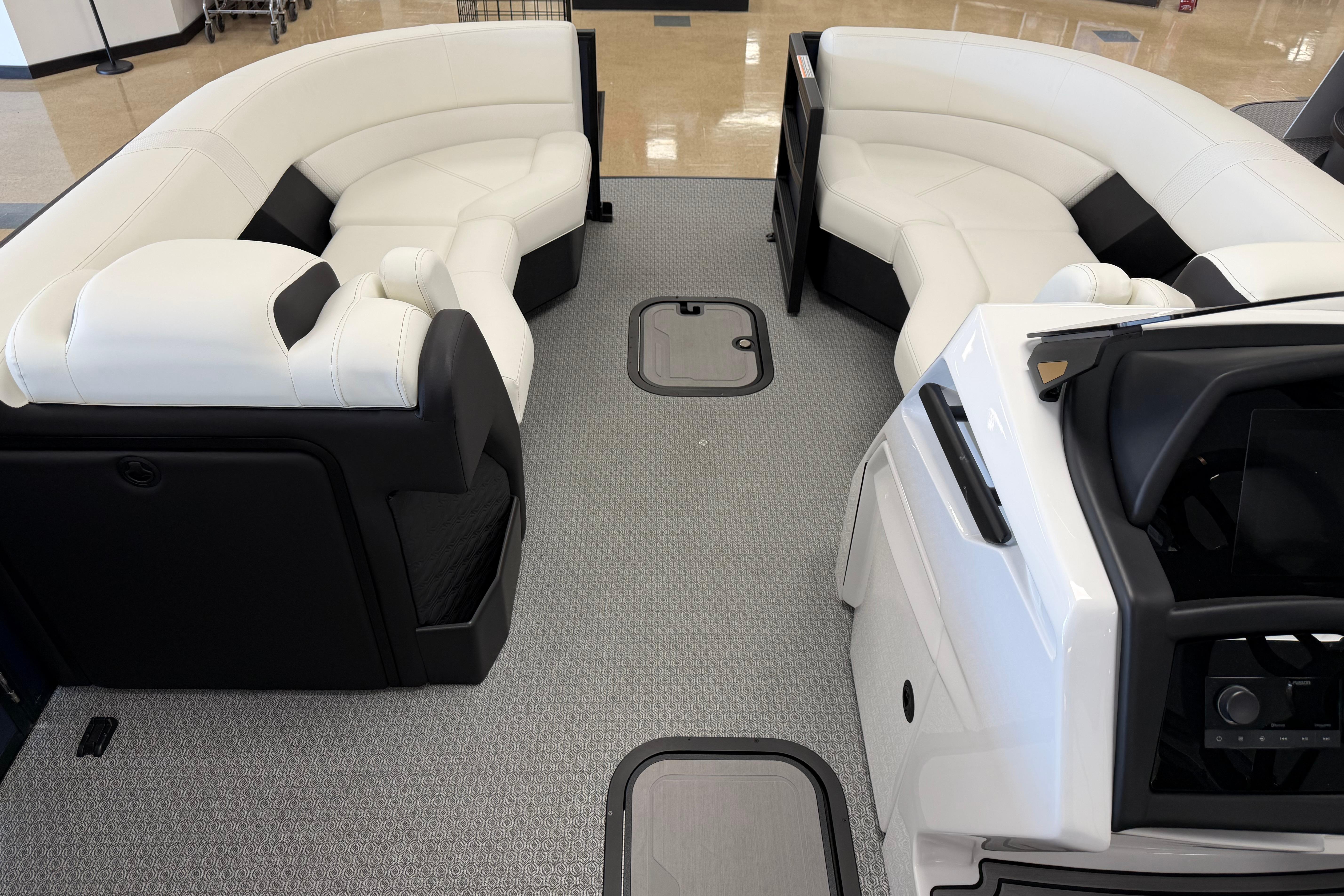 Luxurious interior of 2026 Evotti 721CS boat with plush seating and modern design.