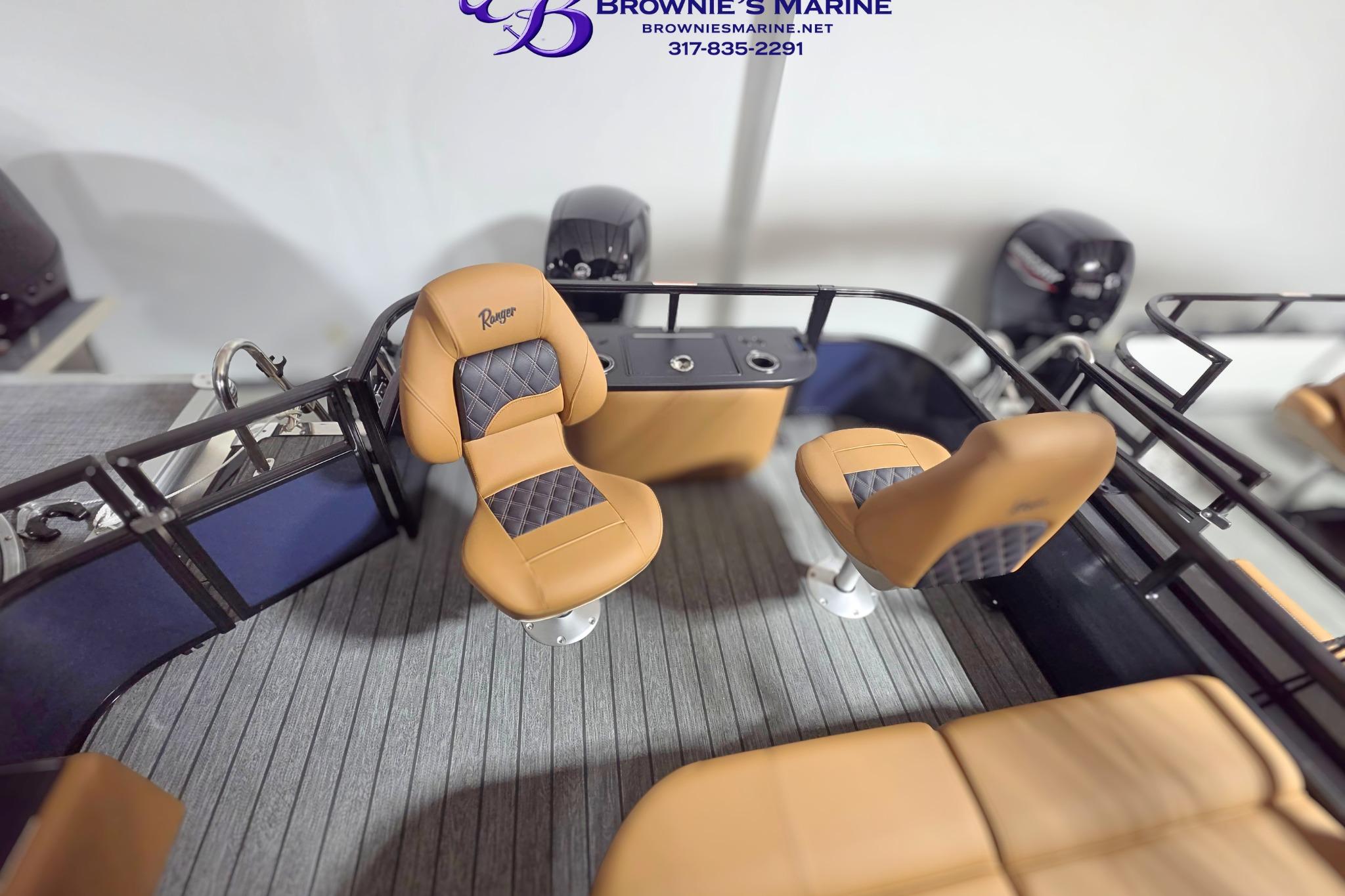 2026 Ranger 220F boat interior with tan and gray seating, featuring modern design and comfort.