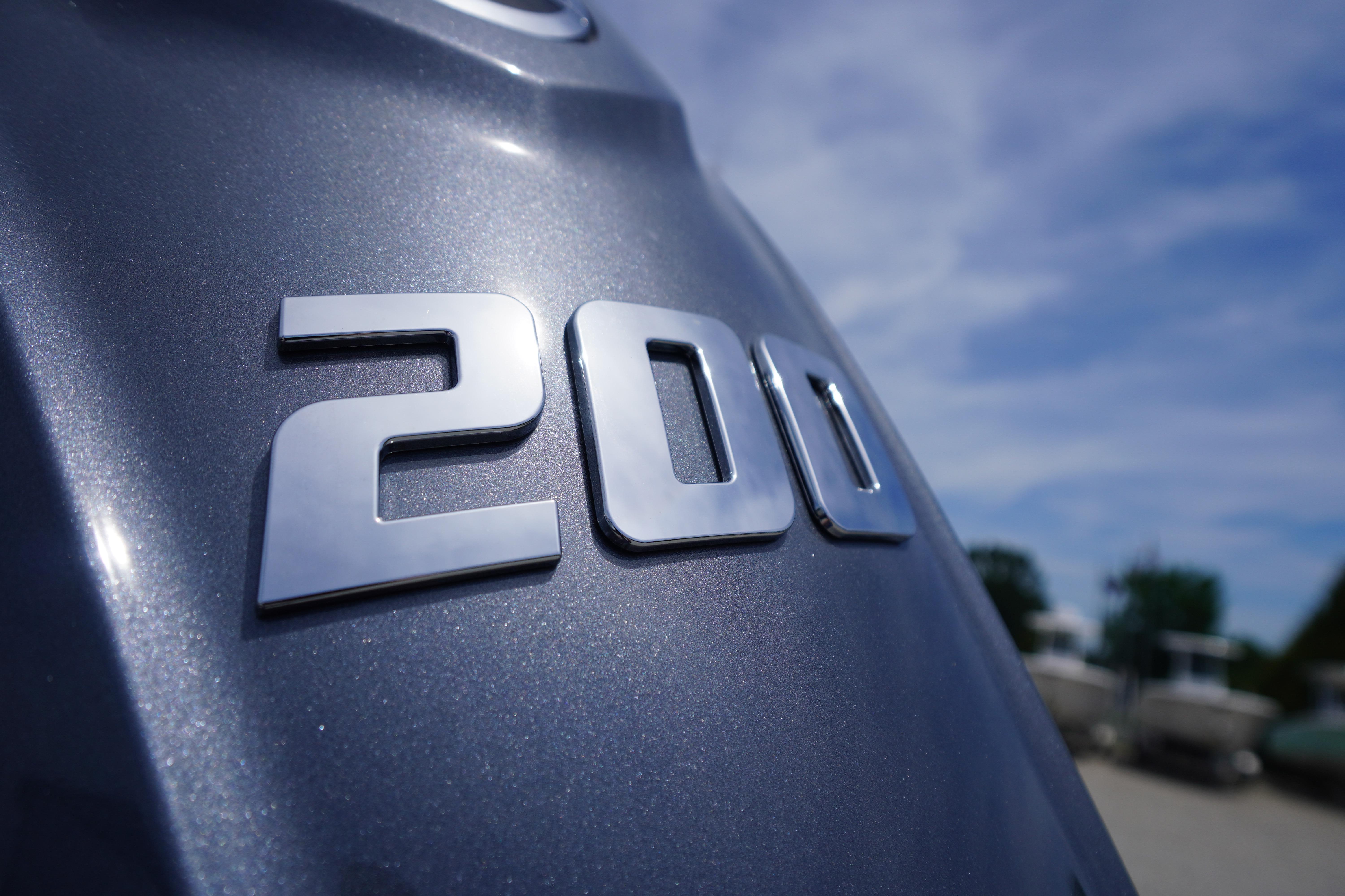 Close-up of "200" emblem on 2026 Chaparral 23 SSi OB boat.