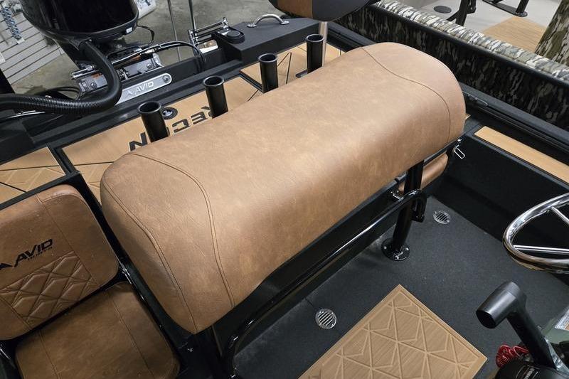 Interior of 2026 Avid 207 Recon boat with tan seating and steering wheel.