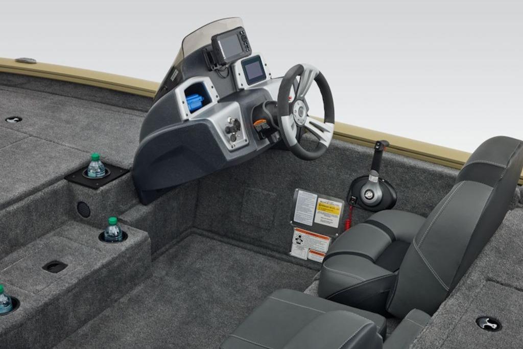 2026 Tracker Pro Team 195 boat interior with steering console and seating.