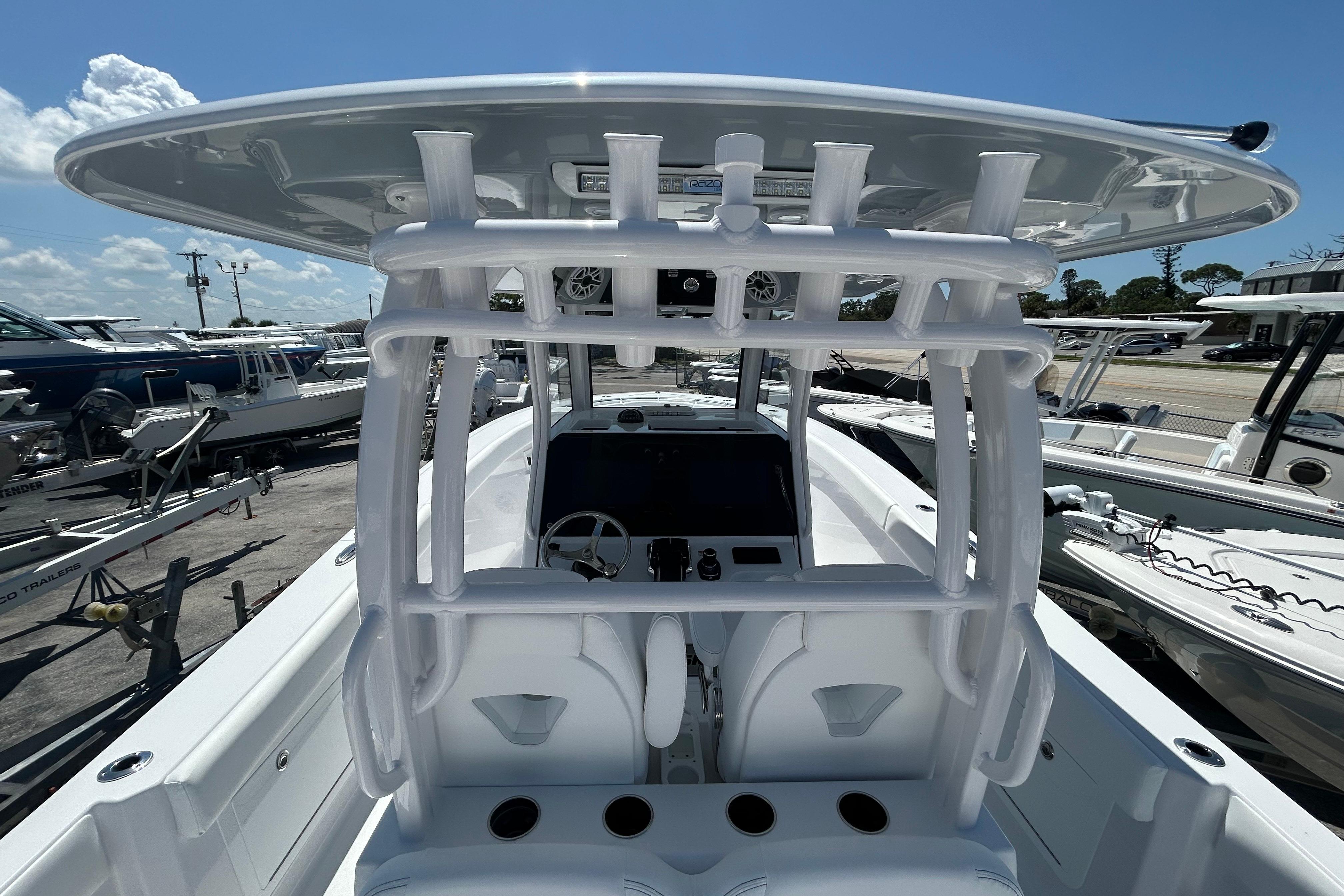 2026 Sportsman Heritage 321 Center Console boat interior with helm and seating.