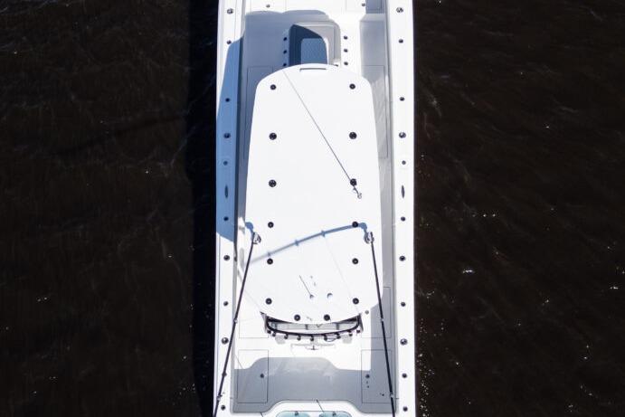 Aerial view of a 2026 Front Runner 37 Catamaran on dark water.