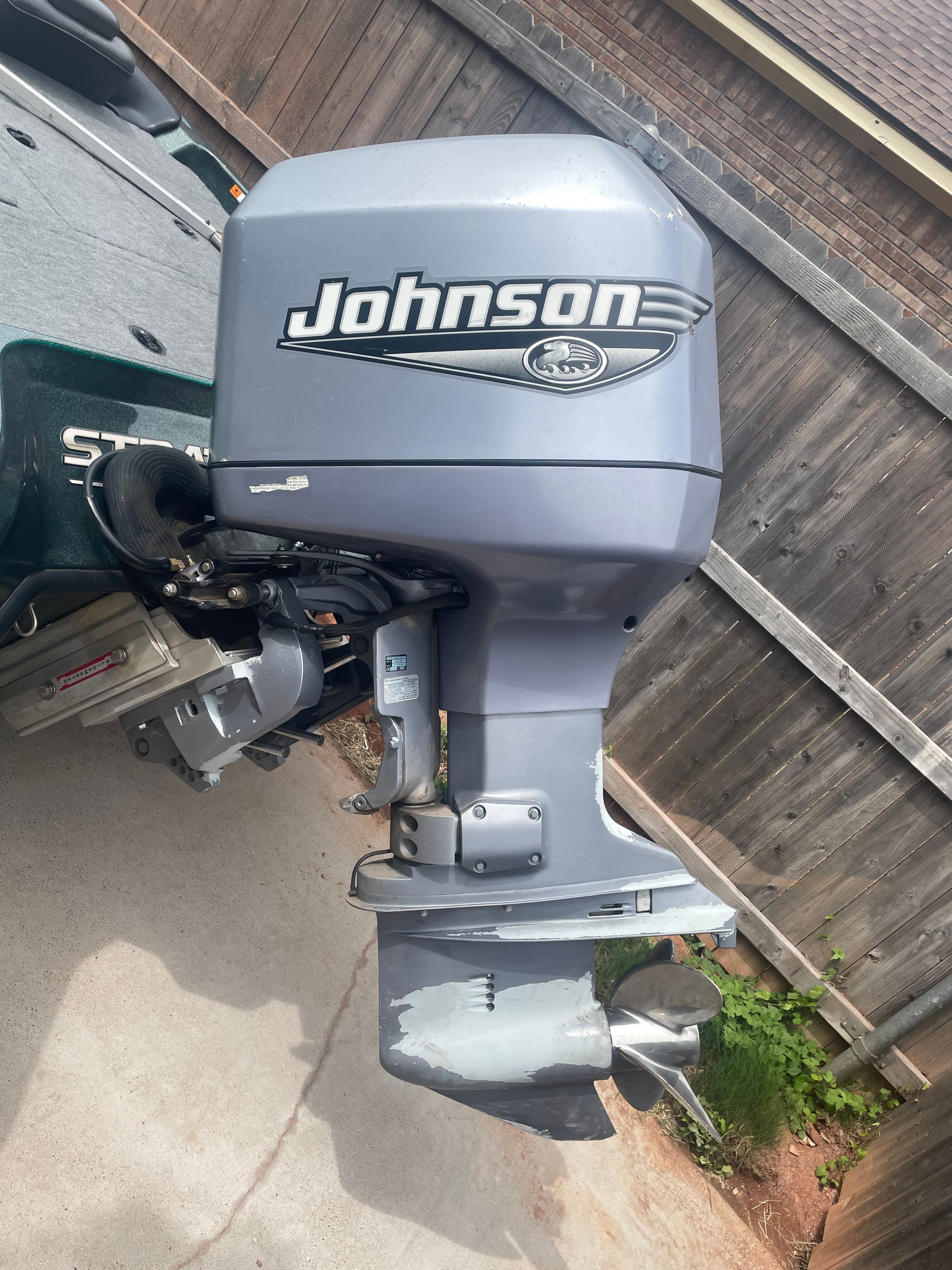 Outboard motor of a 2000 Stratos 19 SS boat.