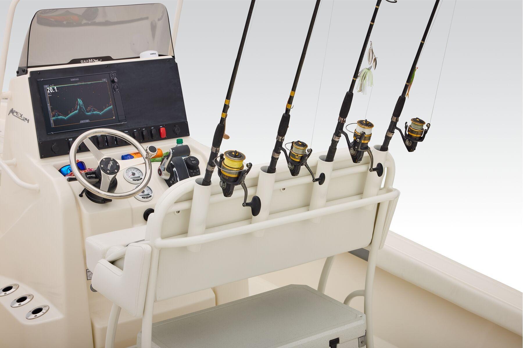 Control panel and fishing rods on 2026 Mako 24 APEX boat.
