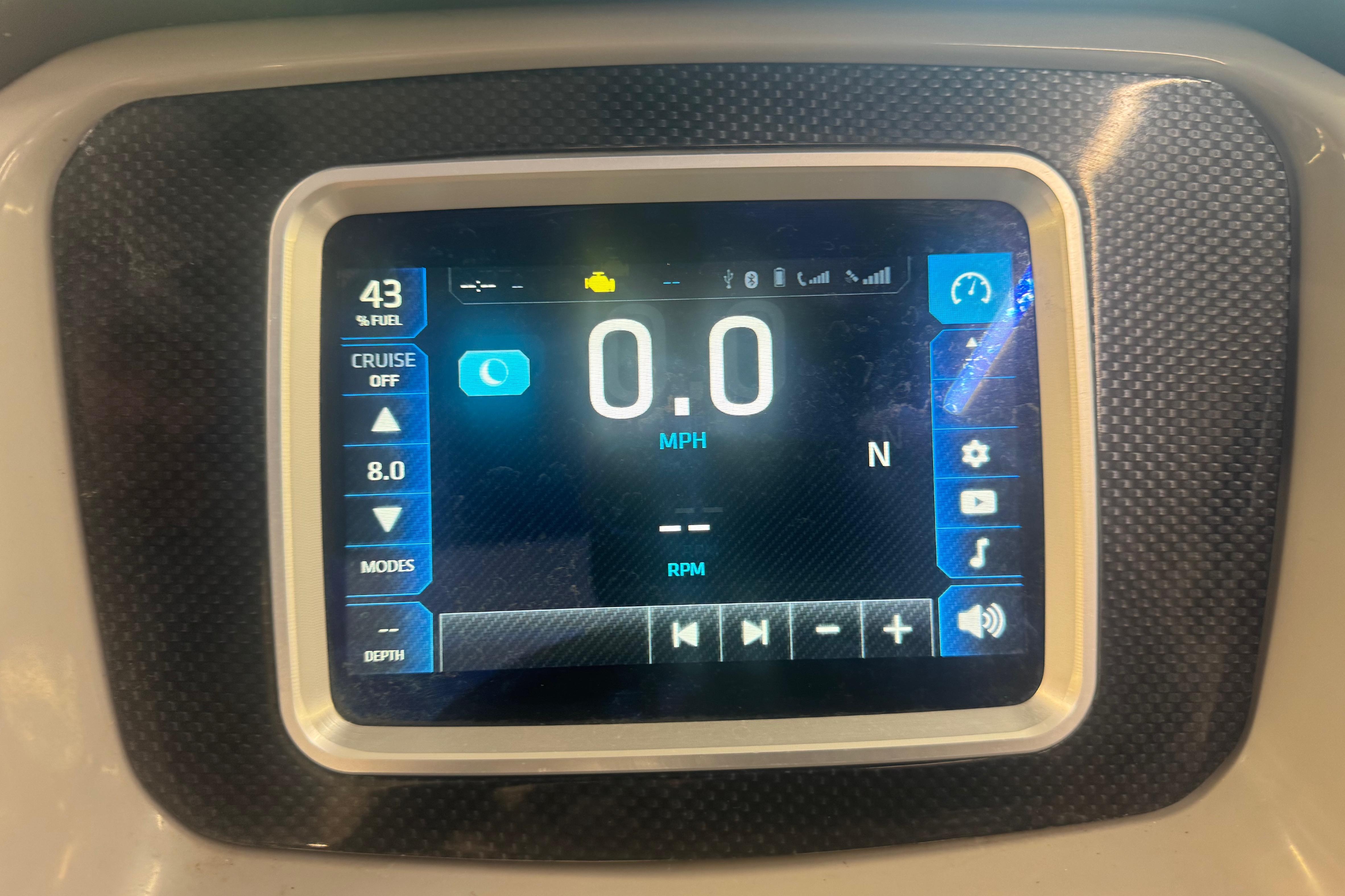 Dashboard display of a 2017 Chaparral Vortex 203 VRX showing speed and fuel level.