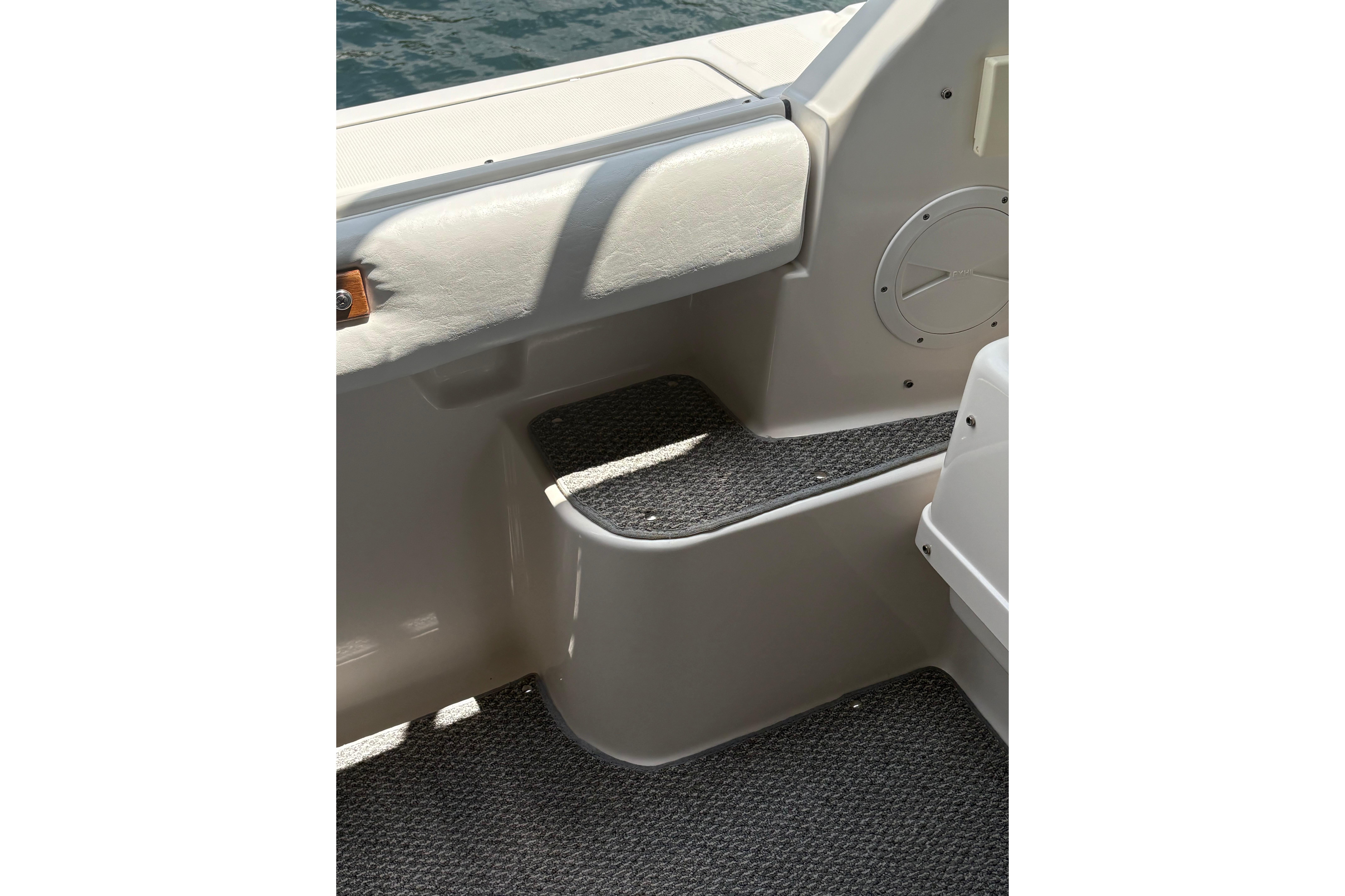 1999 Tiara Yachts 3100 Open interior step detail with textured flooring.