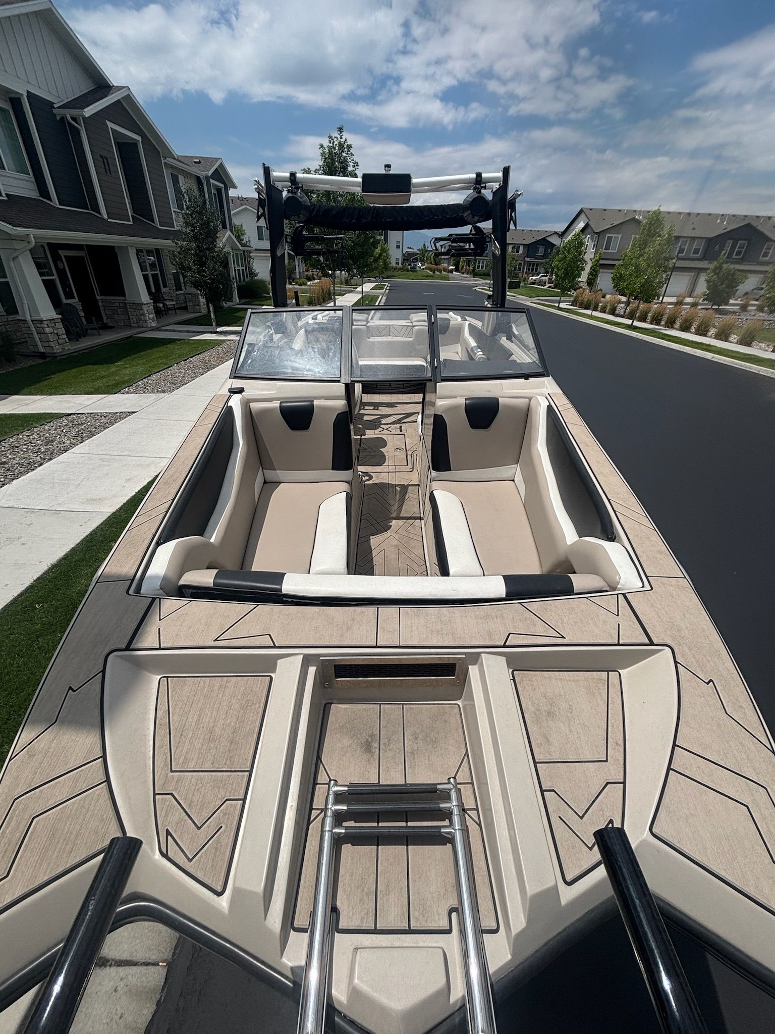Custom DSB25 boat on street, modern design, 2025 model.