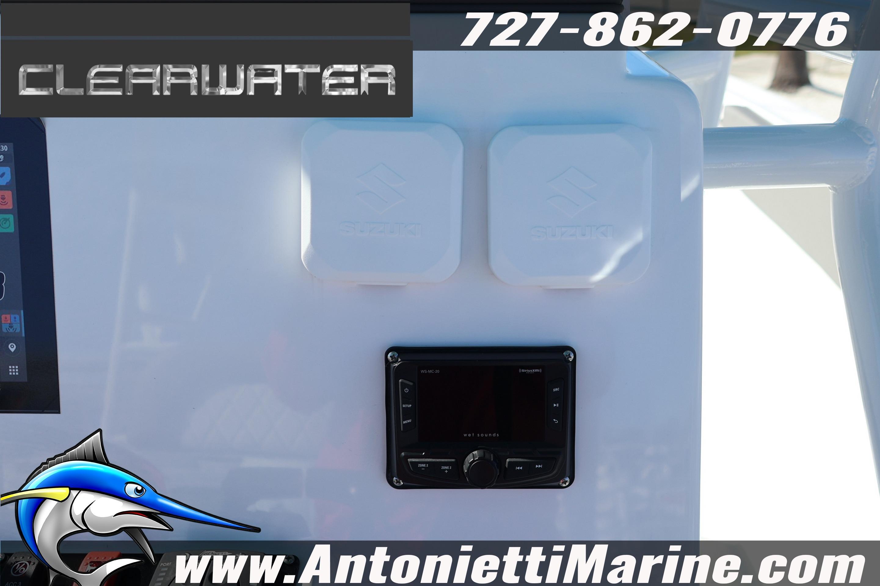 Clearwater 2300 boat dashboard with controls, logo, and contact information, 2026 model.