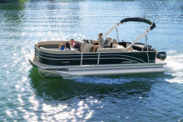 Manufacturer Provided Image: Manufacturer Provided Image: 2025 Harris Cruiser 230 pontoon boat cruising on a sunny lake.