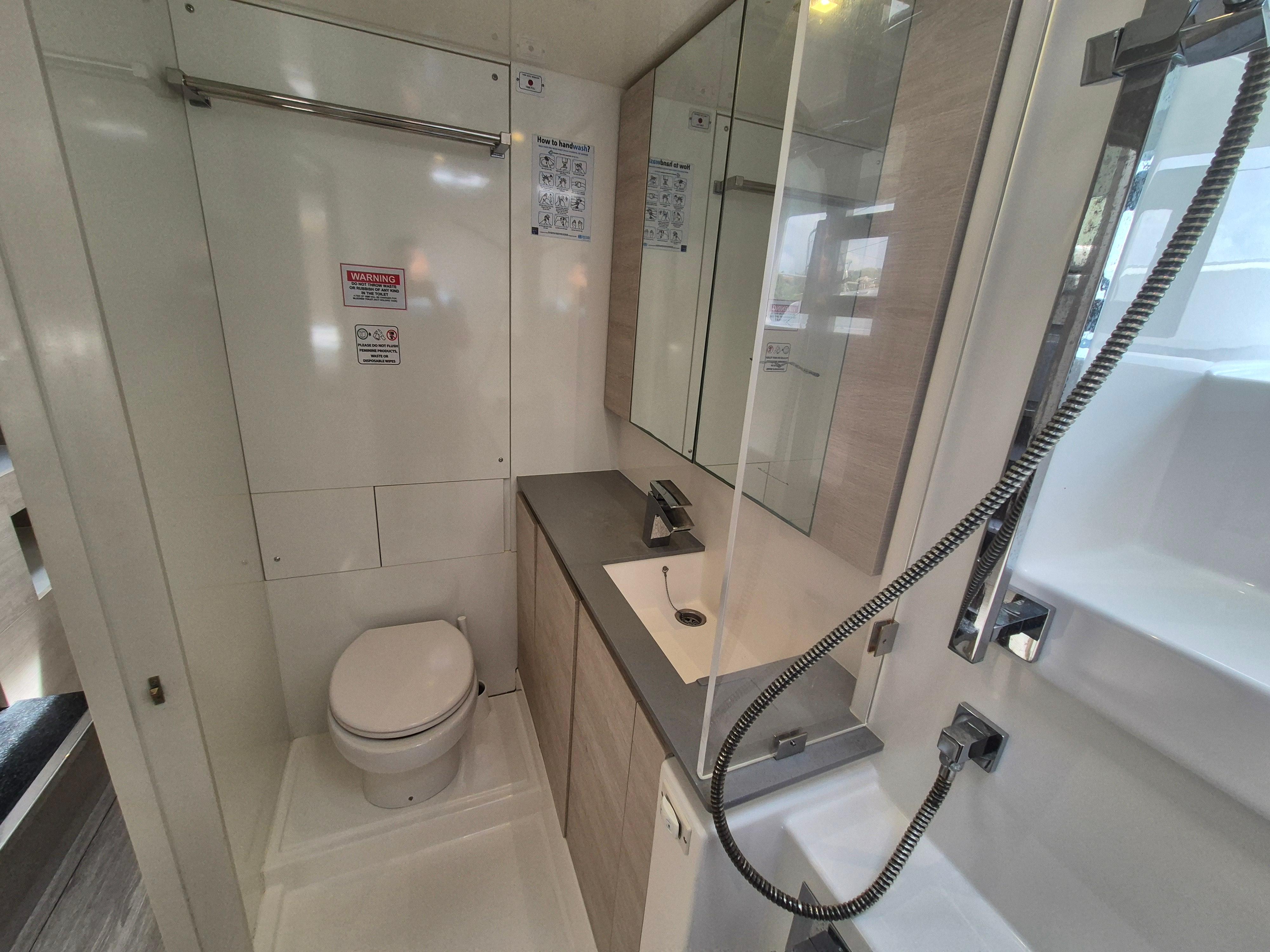 Modern bathroom in a 2021 Leopard 50 yacht.