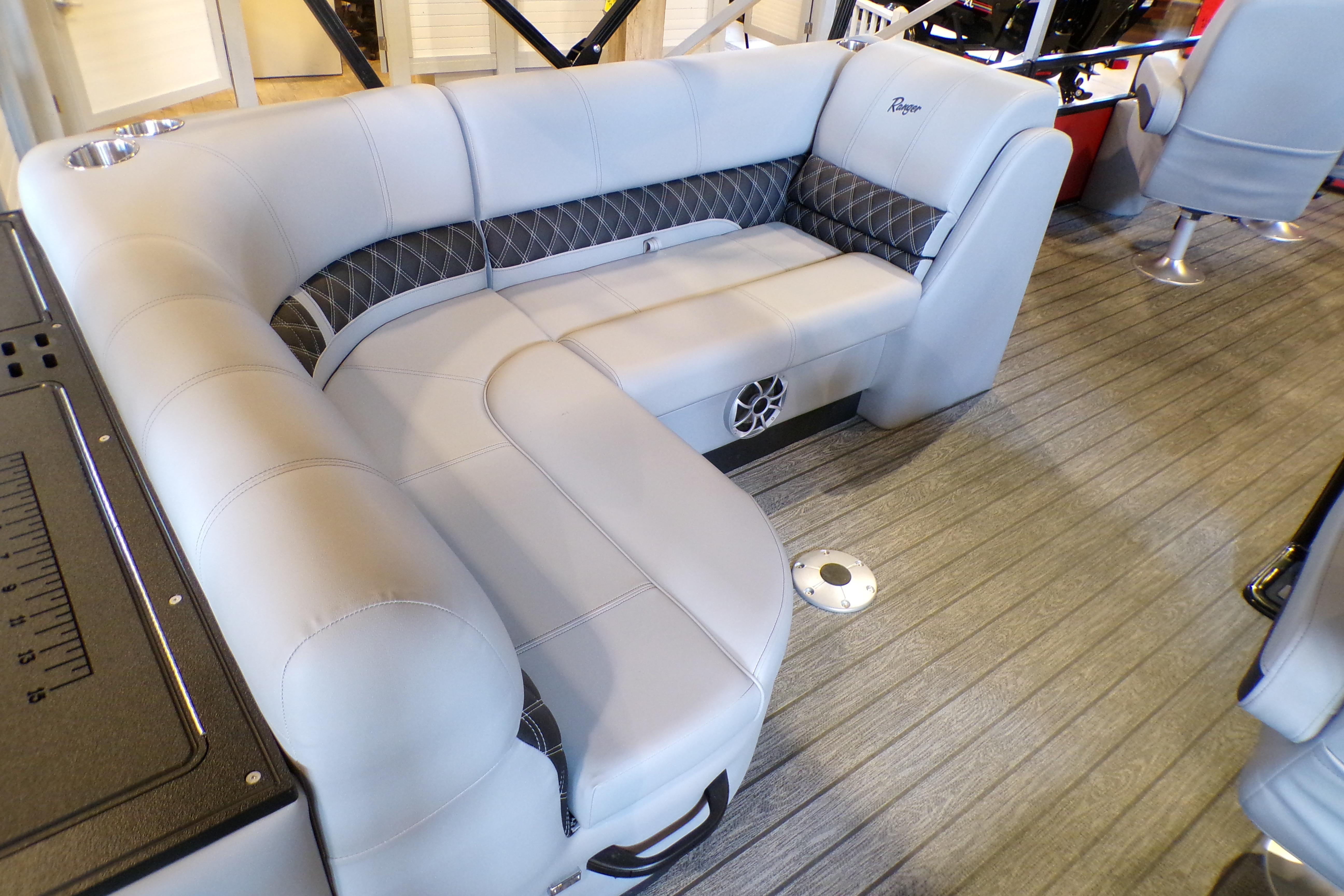 Luxurious seating on 2026 Ranger 220FC boat with modern design and comfortable upholstery.