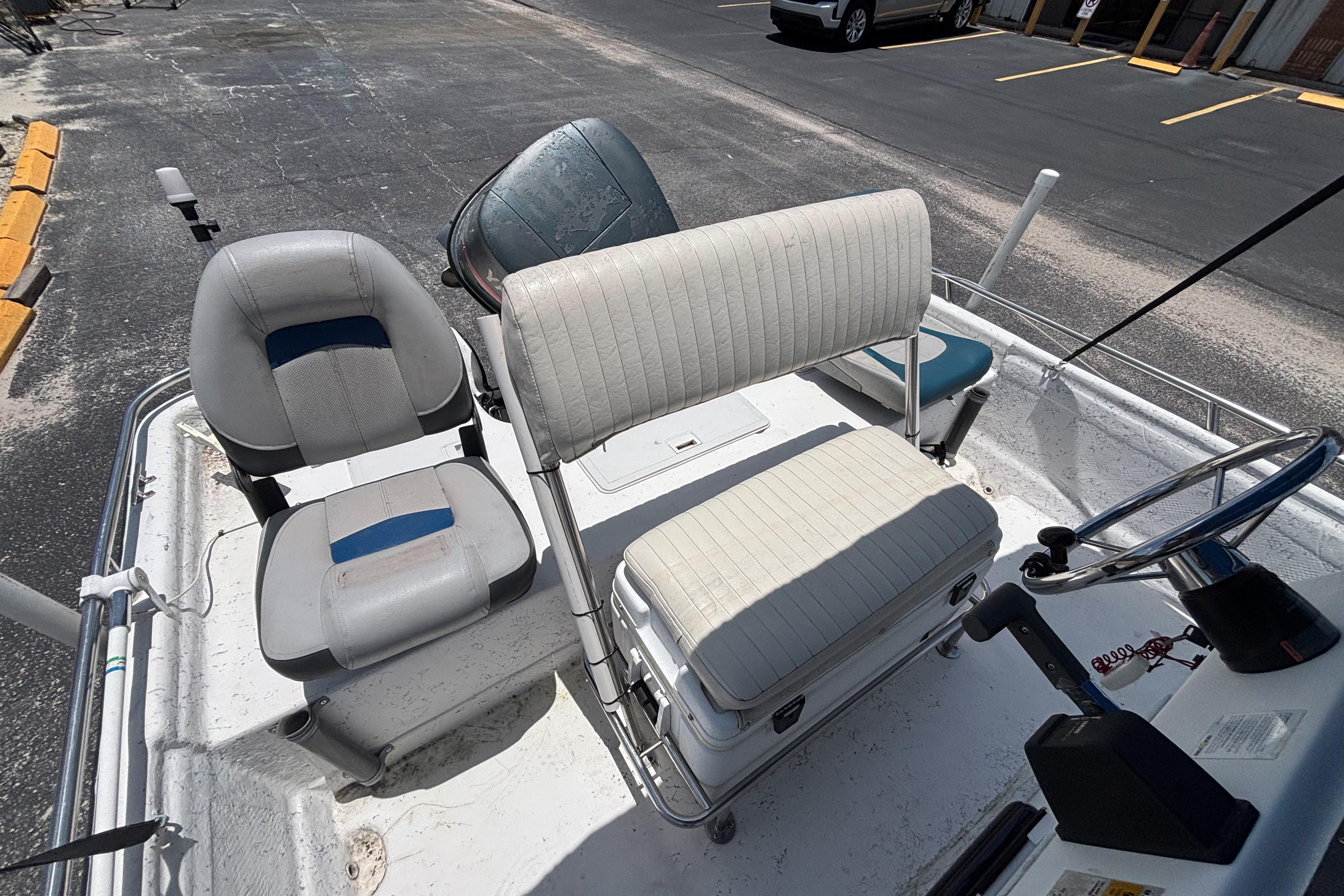 2000 VIP 1880 BAY STEALTH boat interior with seating and steering wheel.