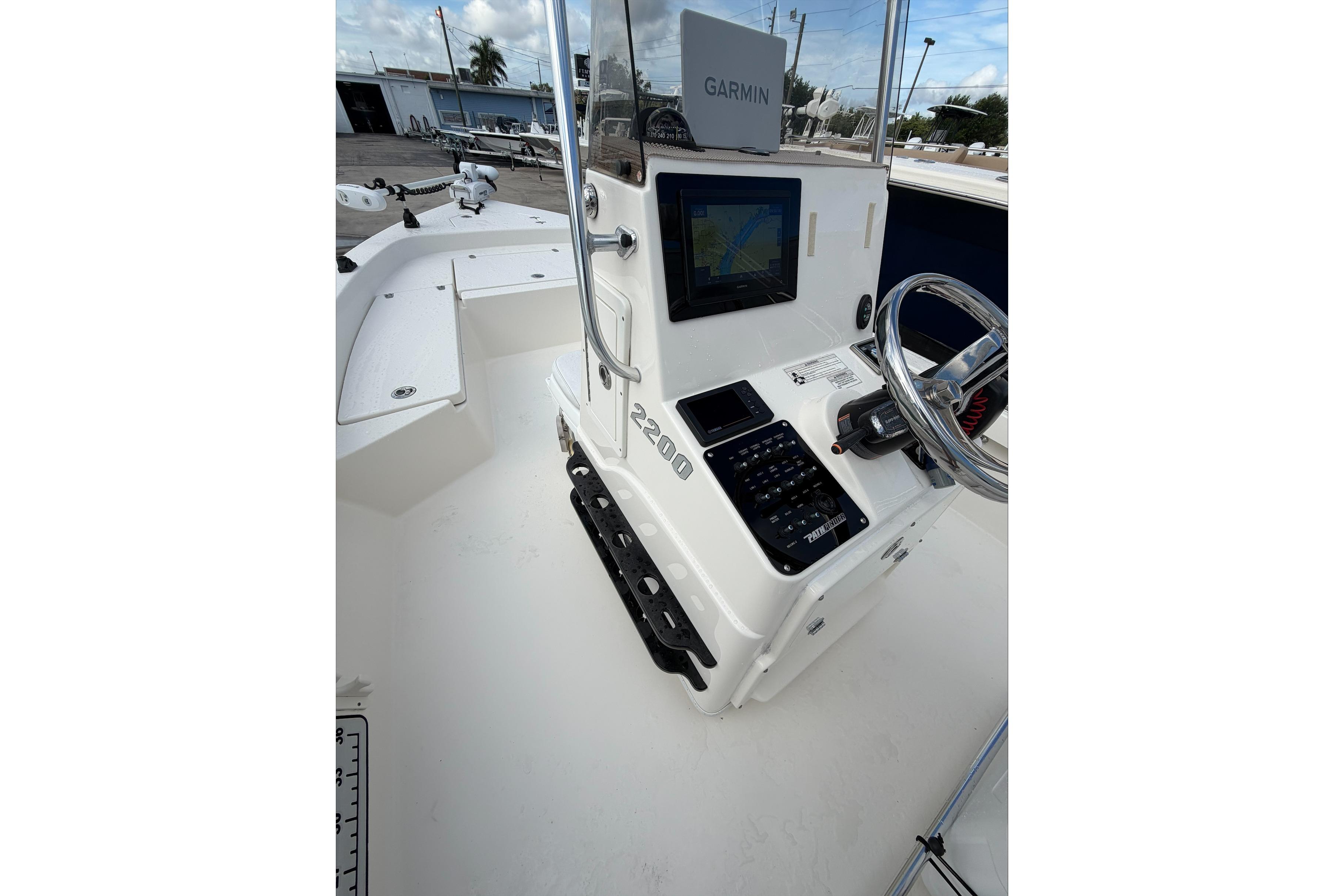 2017 Pathfinder 2200 TRS boat console with Garmin navigation system and steering wheel.