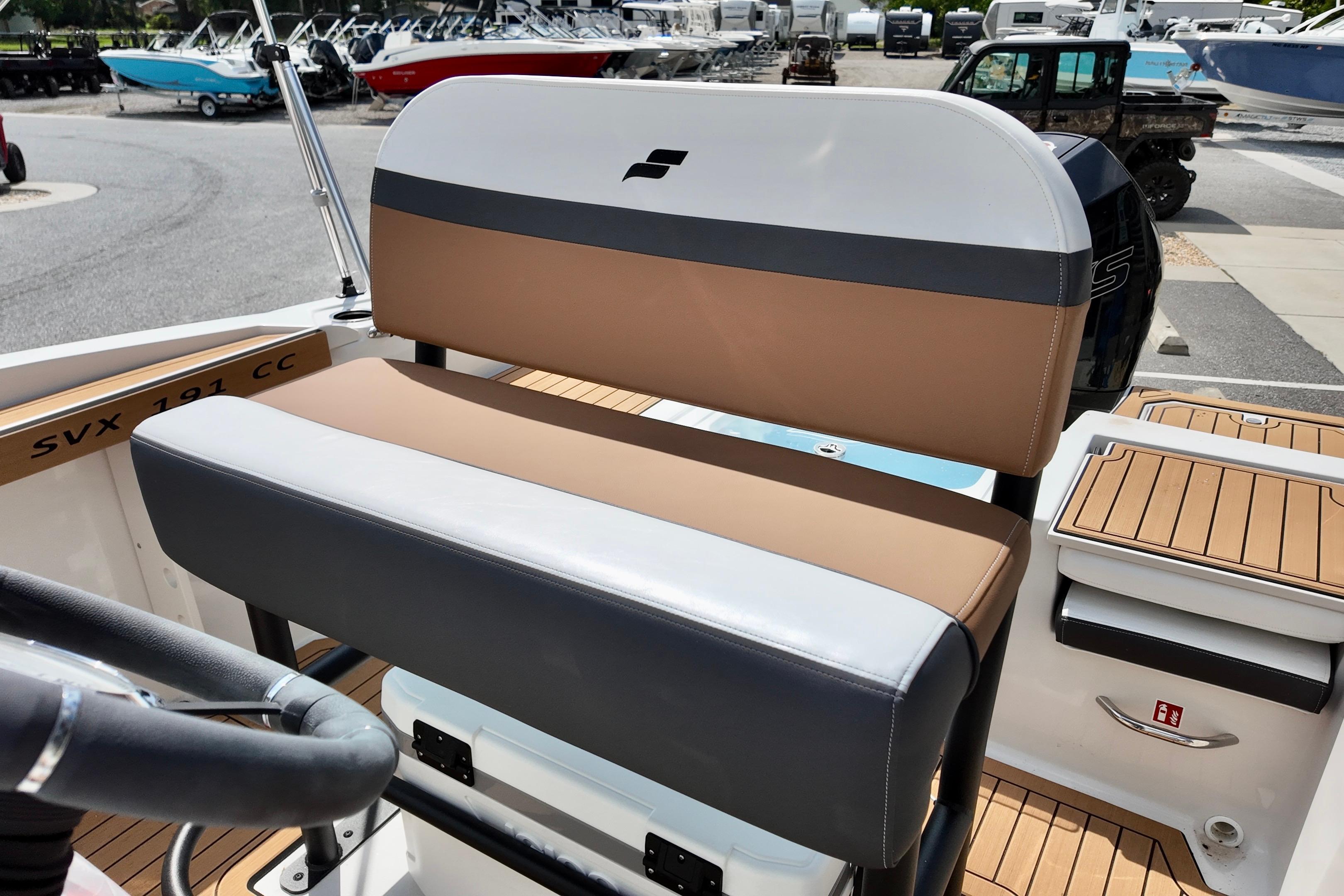 2026 Starcraft SVX 191 OB CC boat interior with tan and gray seating, showcasing modern design.