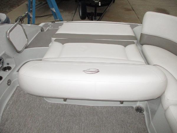 Interior of a 2015 Crownline 285 SS boat with white upholstery.