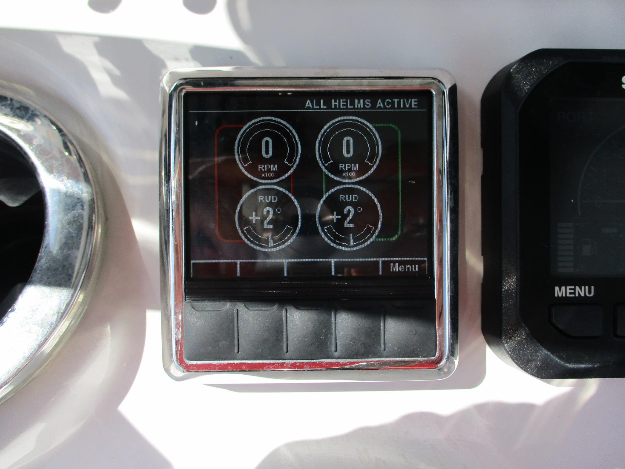 Digital display panel on 2024 Blue Wave 2800 Makaira boat showing RPM and rudder angle.