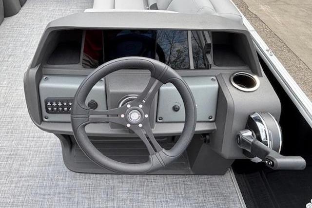 Steering console of 2026 Sun Tracker Party Barge 20 DLX pontoon boat.