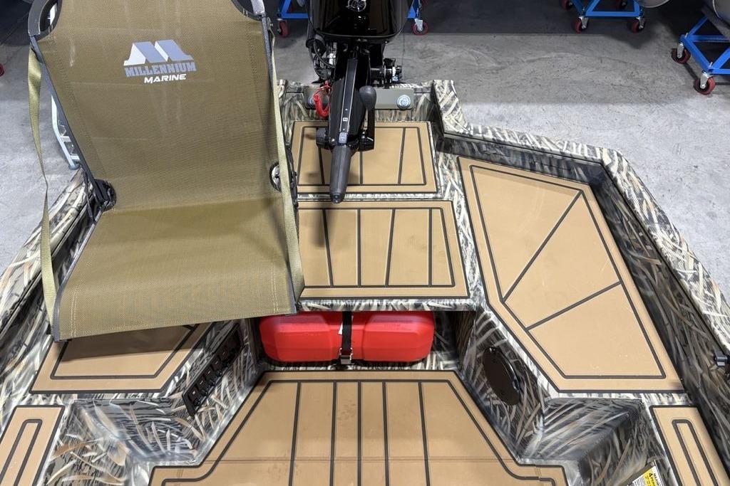 2026 Tracker Grizzly 1650 T Prairie Wings Edition boat interior with Millennium Marine seat.
