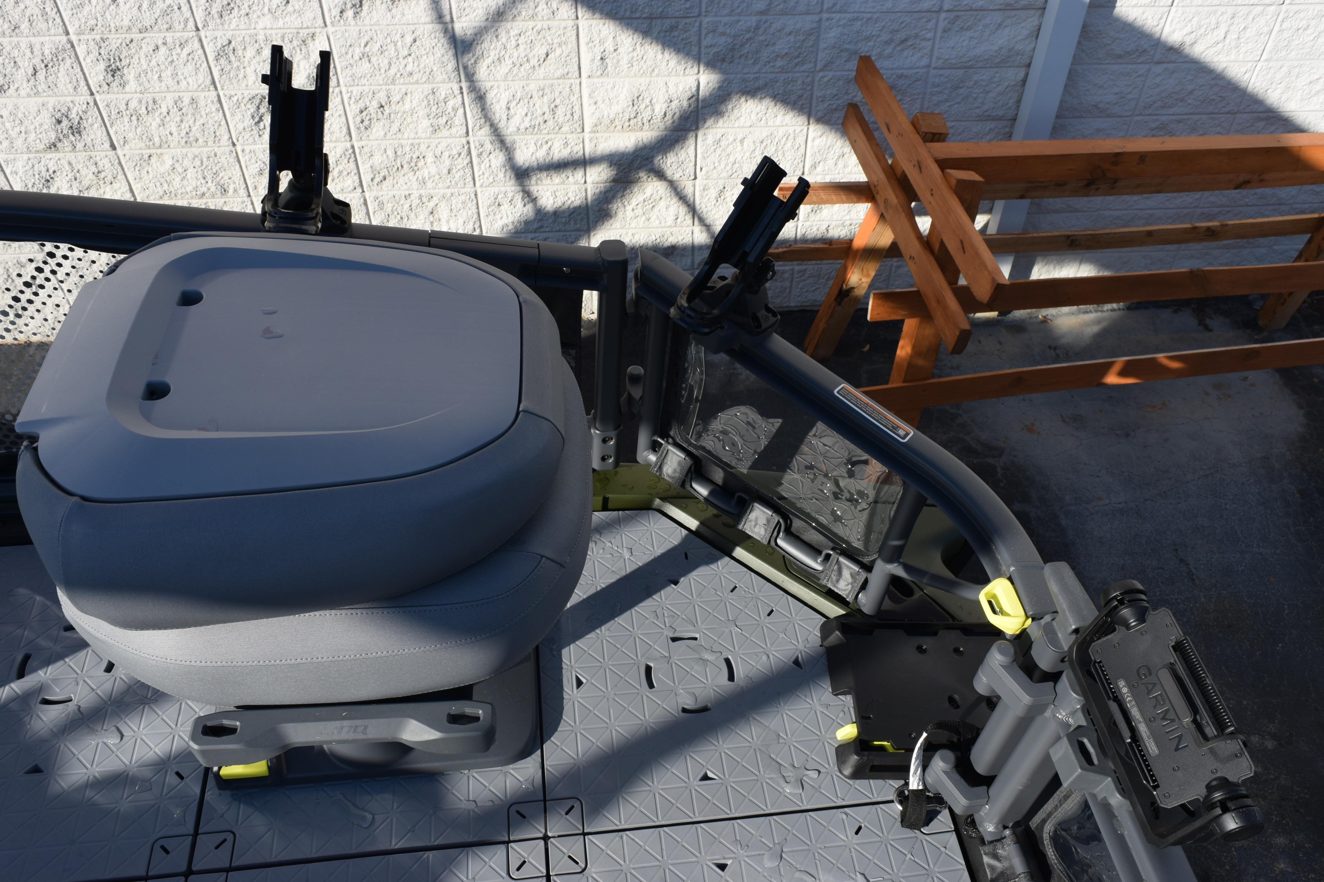 2026 Sea-Doo Switch Fish 21 boat interior with seating and equipment holders.