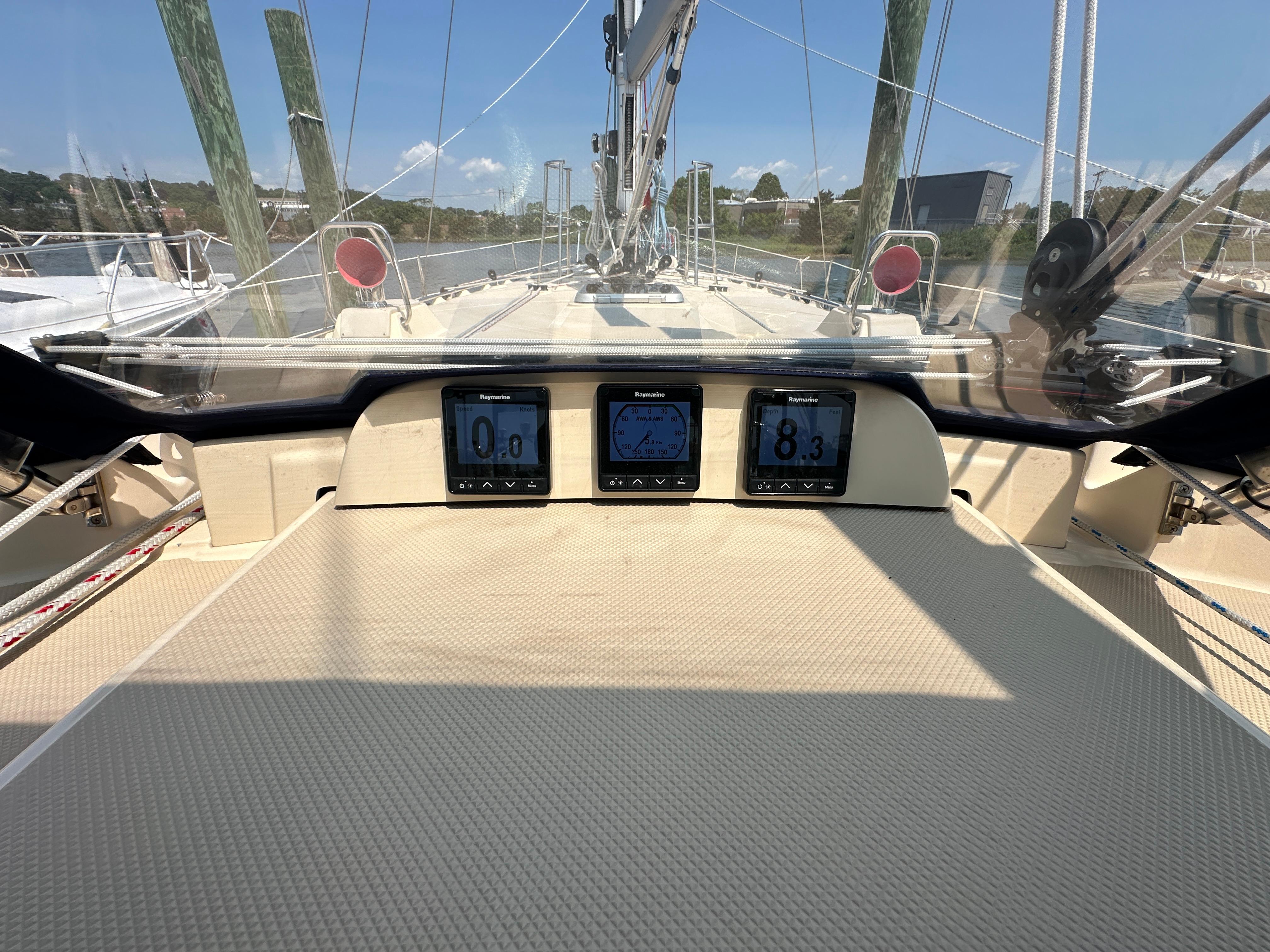 Cockpit view of 2021 Island Packet 439 sailboat with navigation instruments.