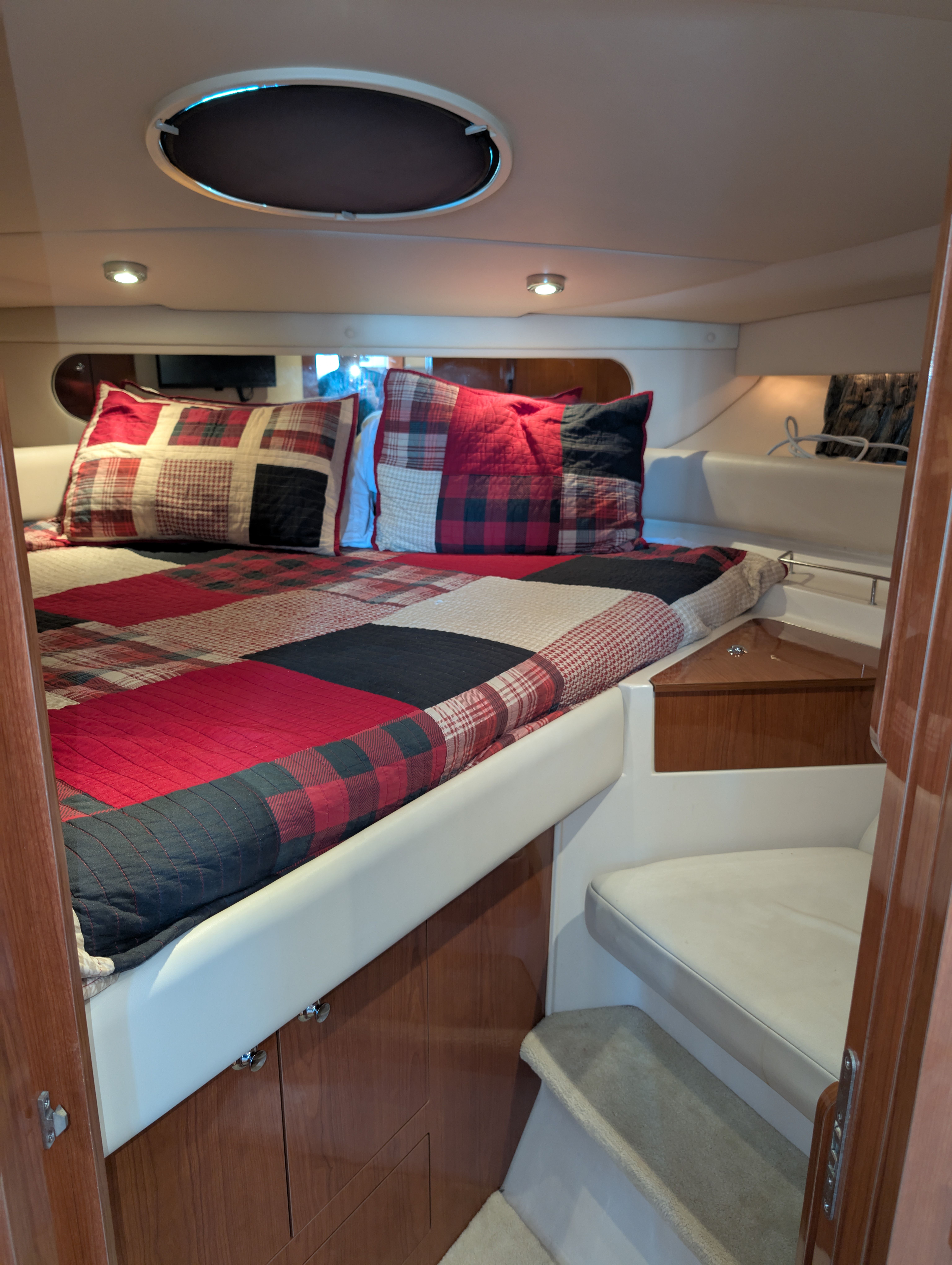 Interior of a Regal Commodore 3560 yacht with cozy bed.