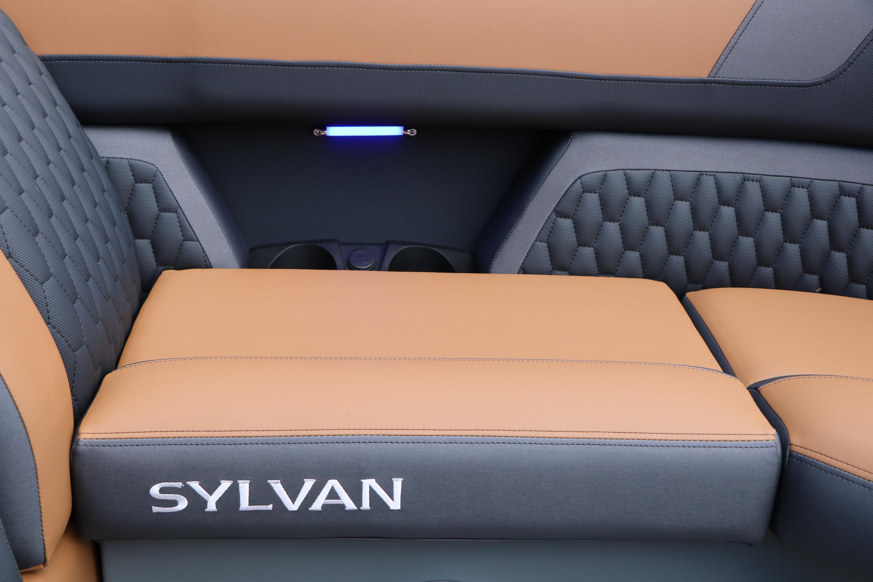 Luxurious seating in the 2026 Sylvan L3 DLZ Bar Platinum Edition Tri-Toon boat.