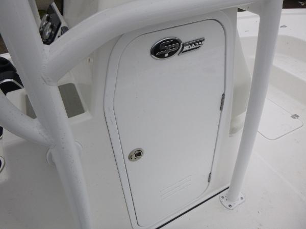 2025 Sea Pro 250 Bay boat console door with logo and secure lock.
