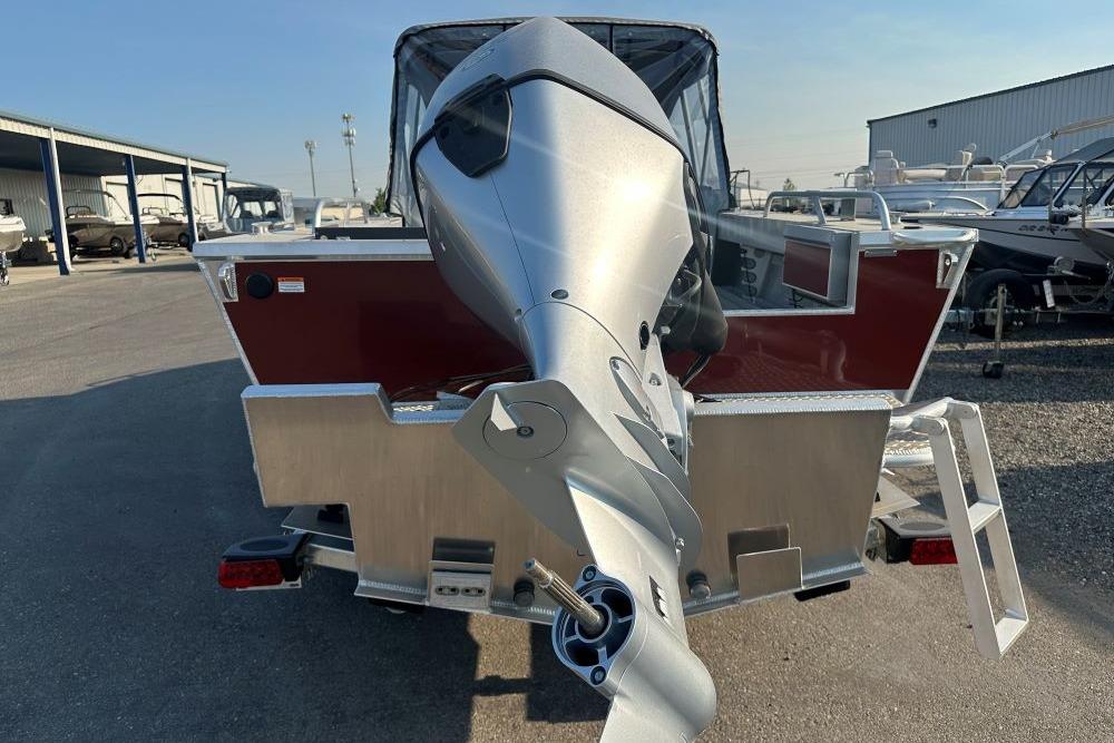 2025 Hewescraft 210 Sea Runner ET boat with powerful outboard motor.