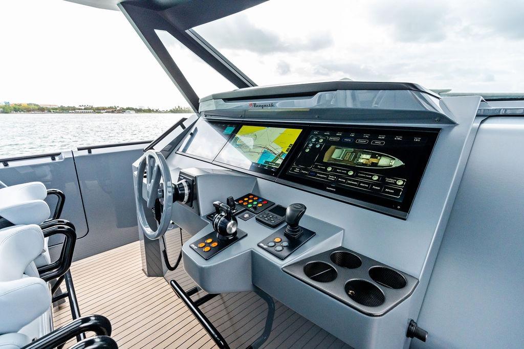 2024 Vanquish Yachts VQ55 helm with advanced navigation displays and controls.