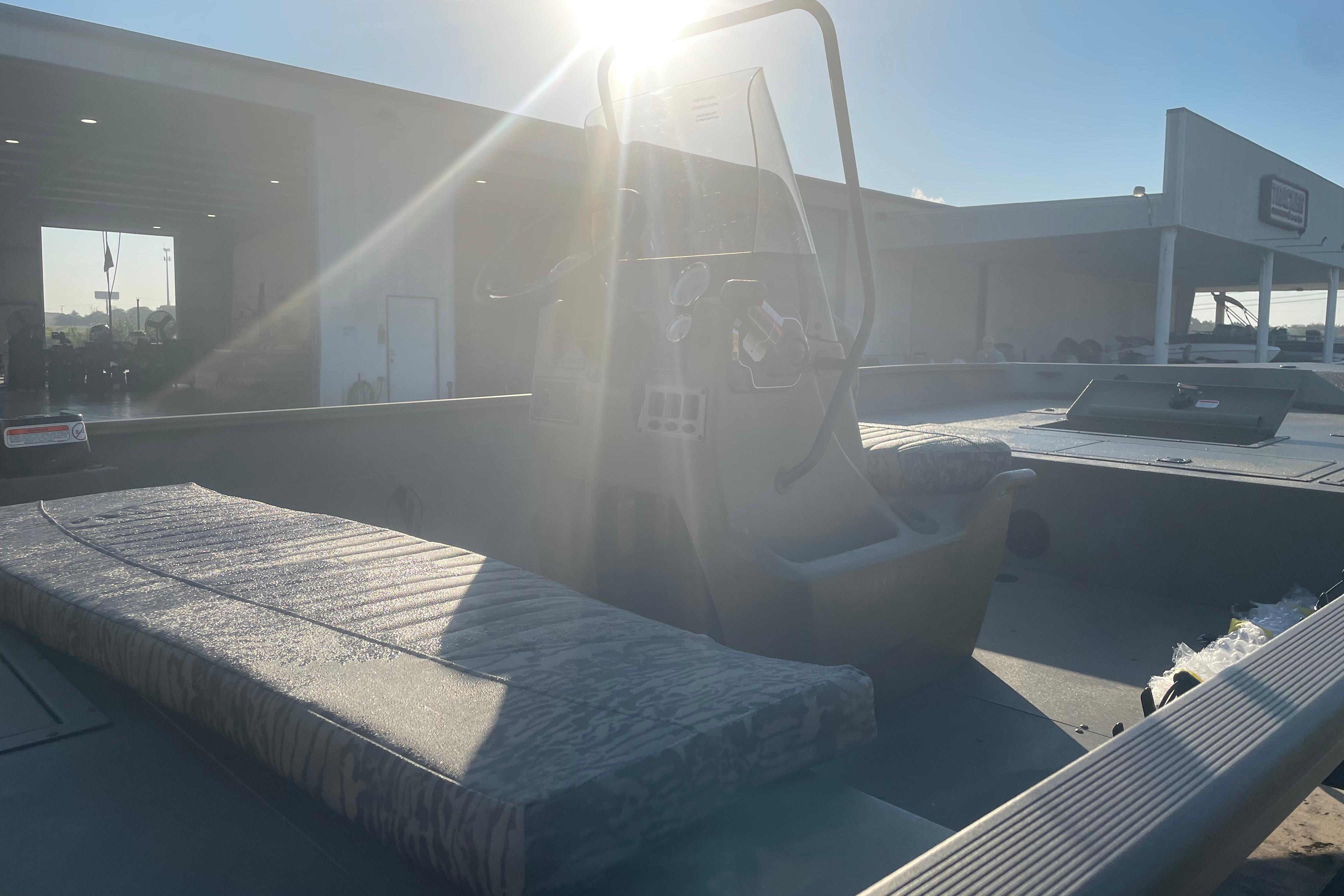 2026 Tracker Grizzly 2072 CC boat interior with sunlight streaming through.