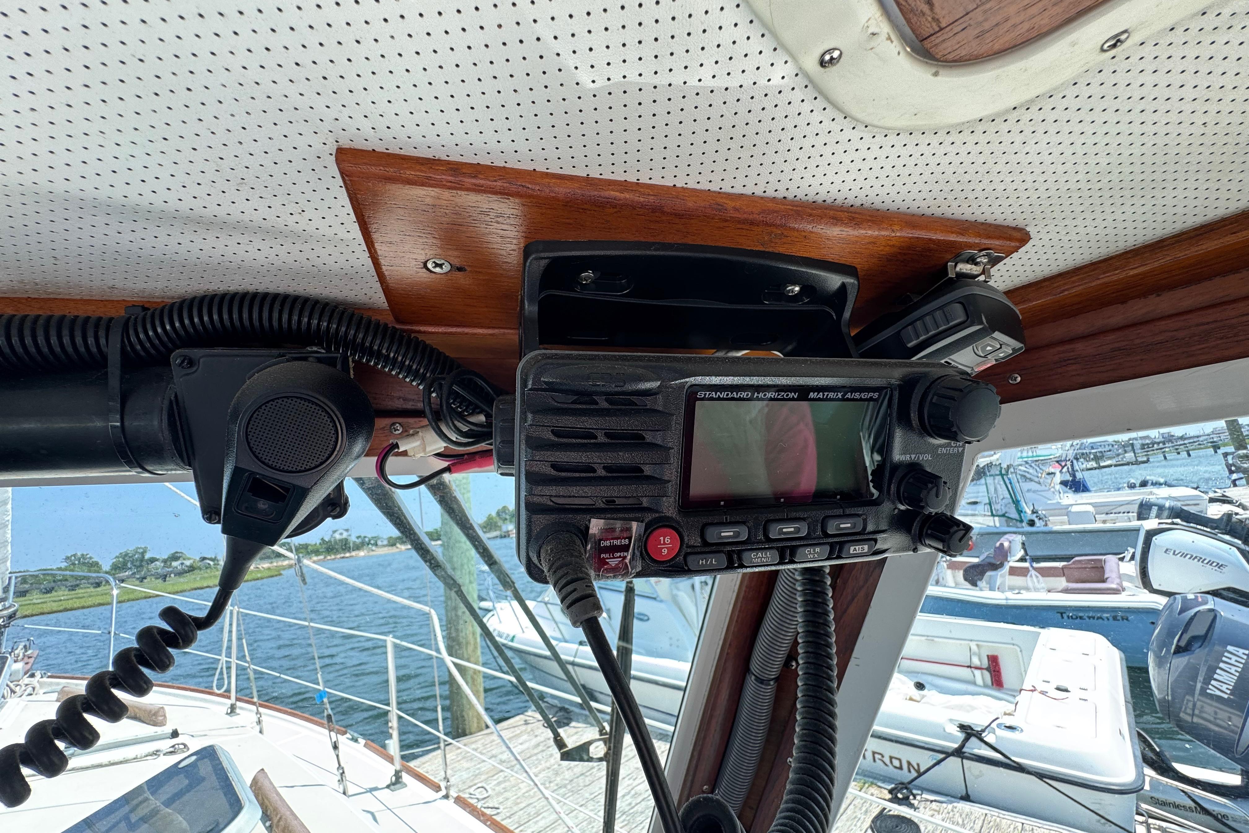 Interior view of a 1989 Cape Dory 30 Motorsailer with marine radio equipment.