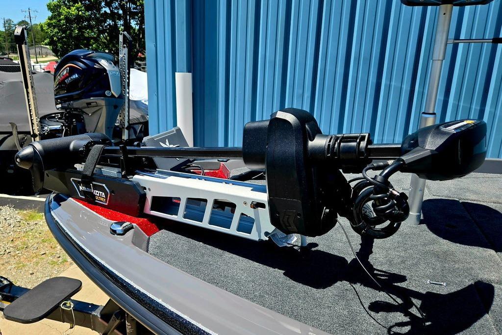 2026 Skeeter ZXE20 boat with Minn Kota Ultrex trolling motor, parked outdoors.