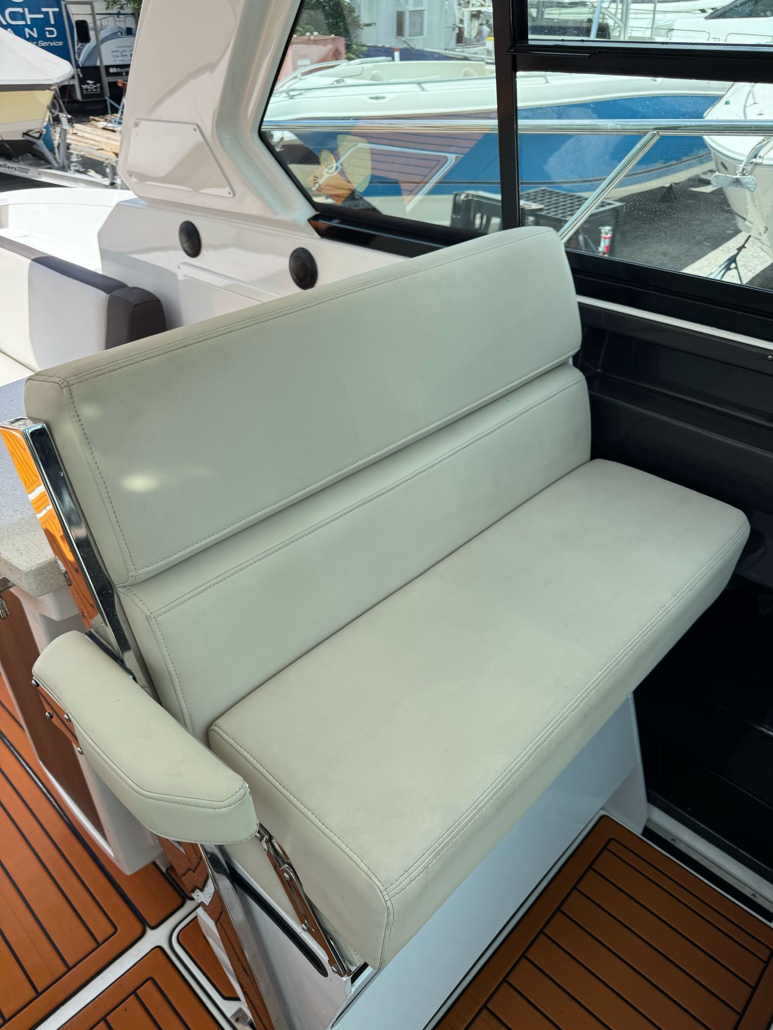 Interior of 2015 Monterey 360 Sport Coupe with beige seating.