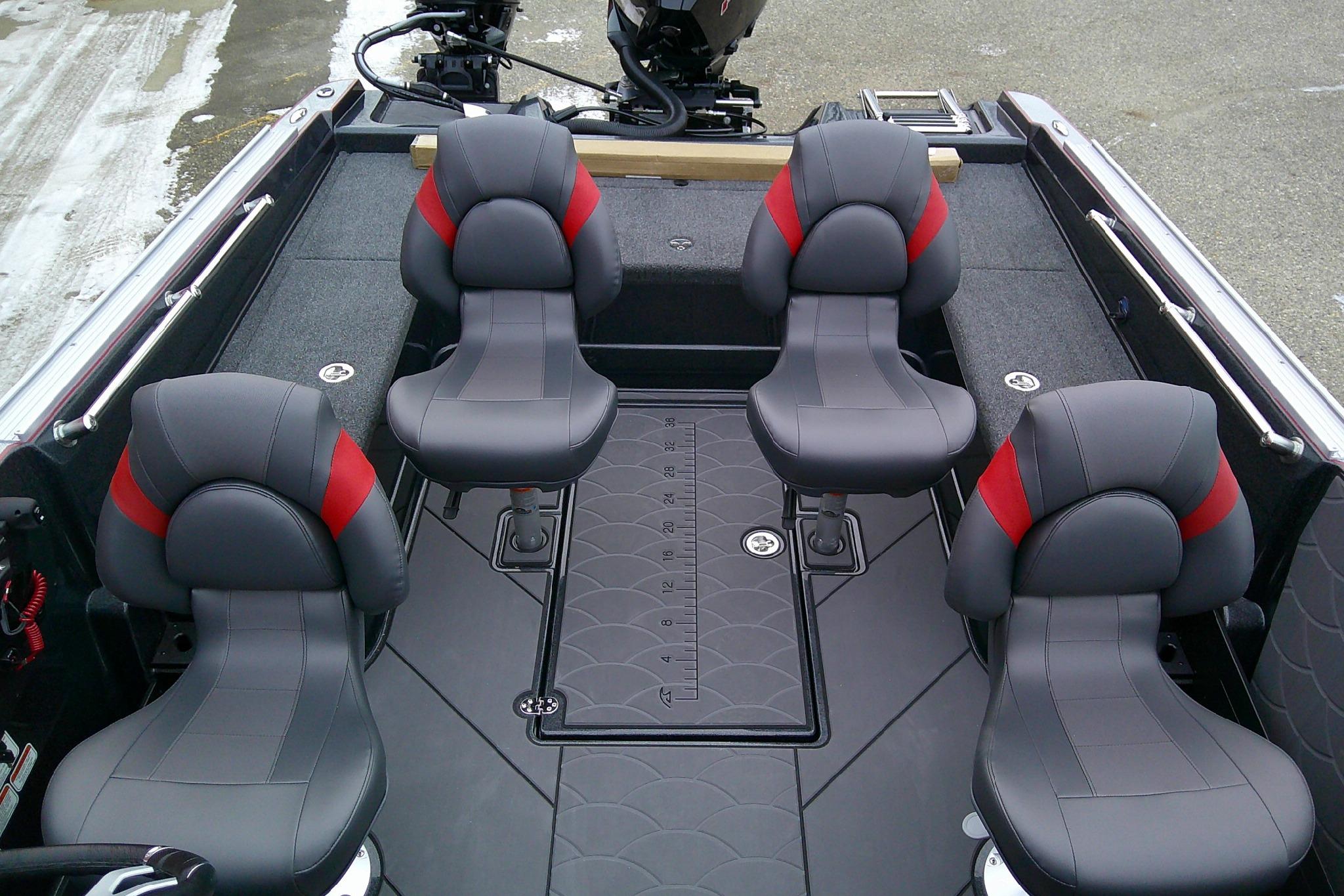 Interior of 2026 Nitro ZV20 Pro boat with four black and red seats.