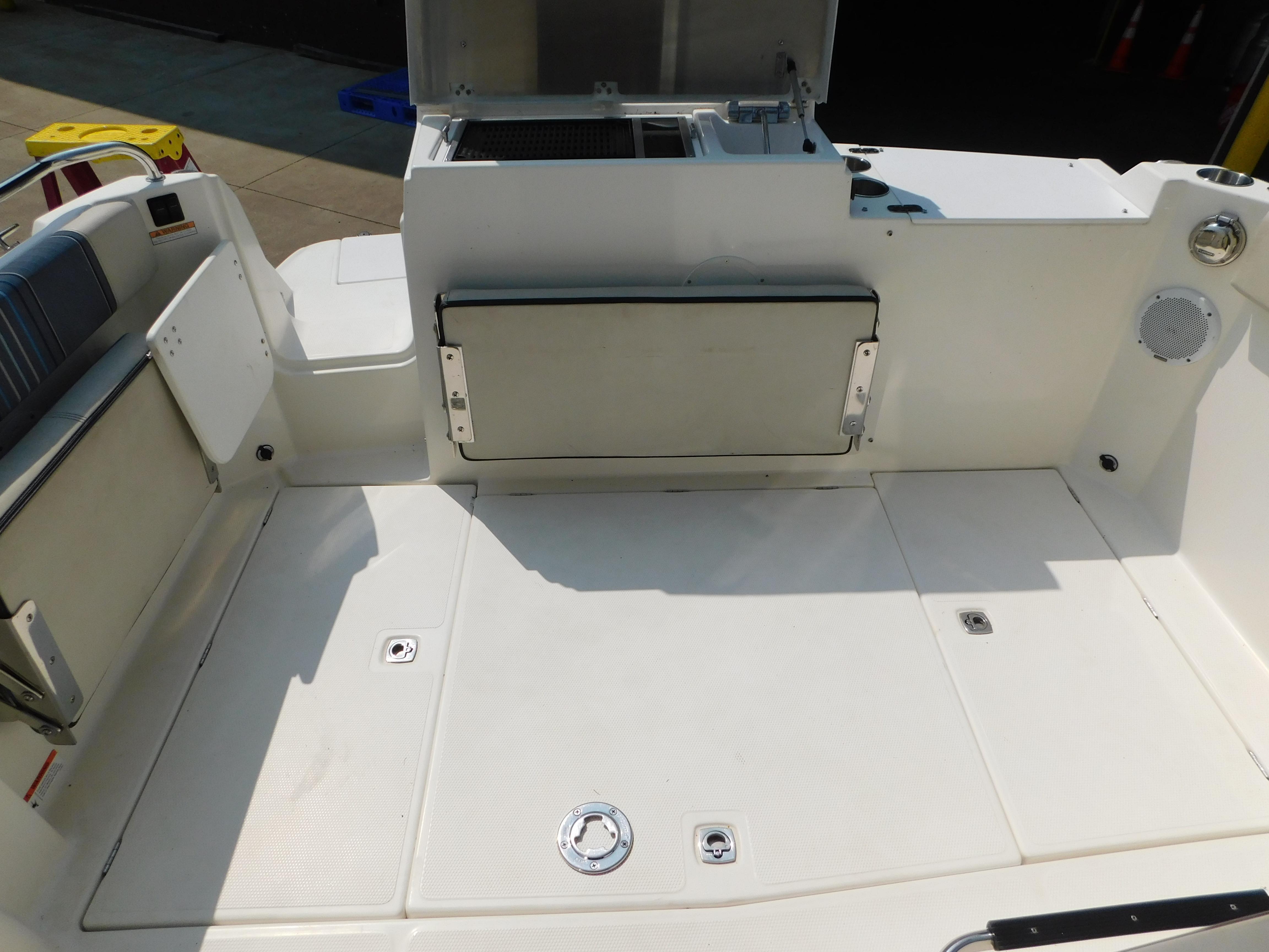 2017 Cutwater C-24 boat deck with seating and storage compartments.